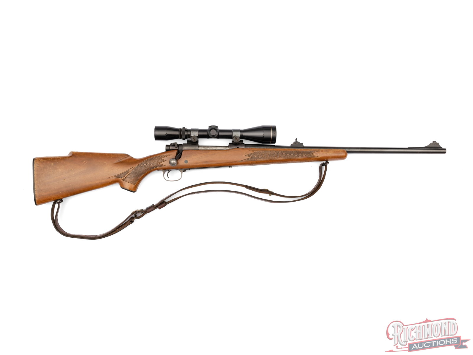 1968 Winchester Model 70 Bolt Action Rifle .270 WIN With Leupold Scope: Manufactured by Winchester in 1968. Features a 22" blued round tapered Winchester Proof Steel barrel. Rear adjustable ramp leaf sight and ramped blade front sight, missing hood. Jeweled bolt with