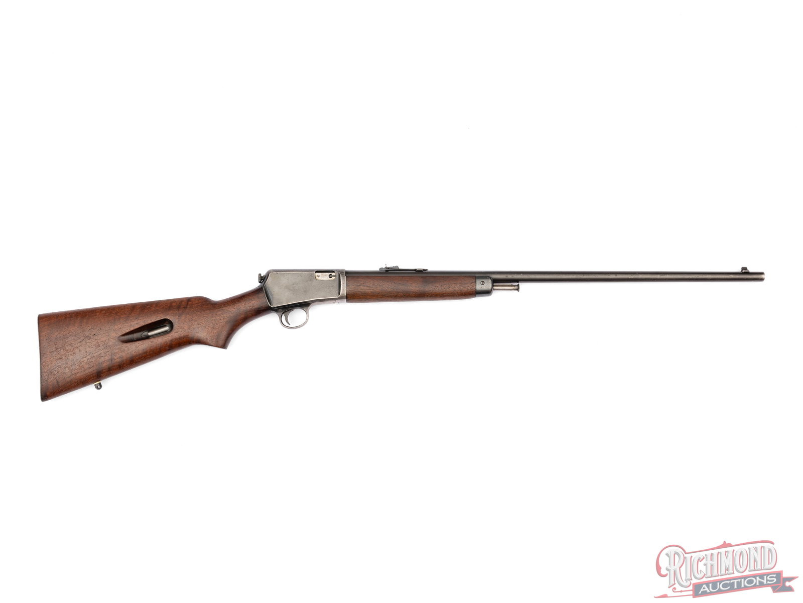 1950 Winchester Model 63 .22 LR Semi-Auto Rifle: Manufactured by Winchester in 1950. Features a 23" Winchester Proof Steel barrel with rear elevation adjustable notch and blade front sight. Barrel is stamped "22 L RIFLE SUPERSPEED & SUPER X". Semi-a