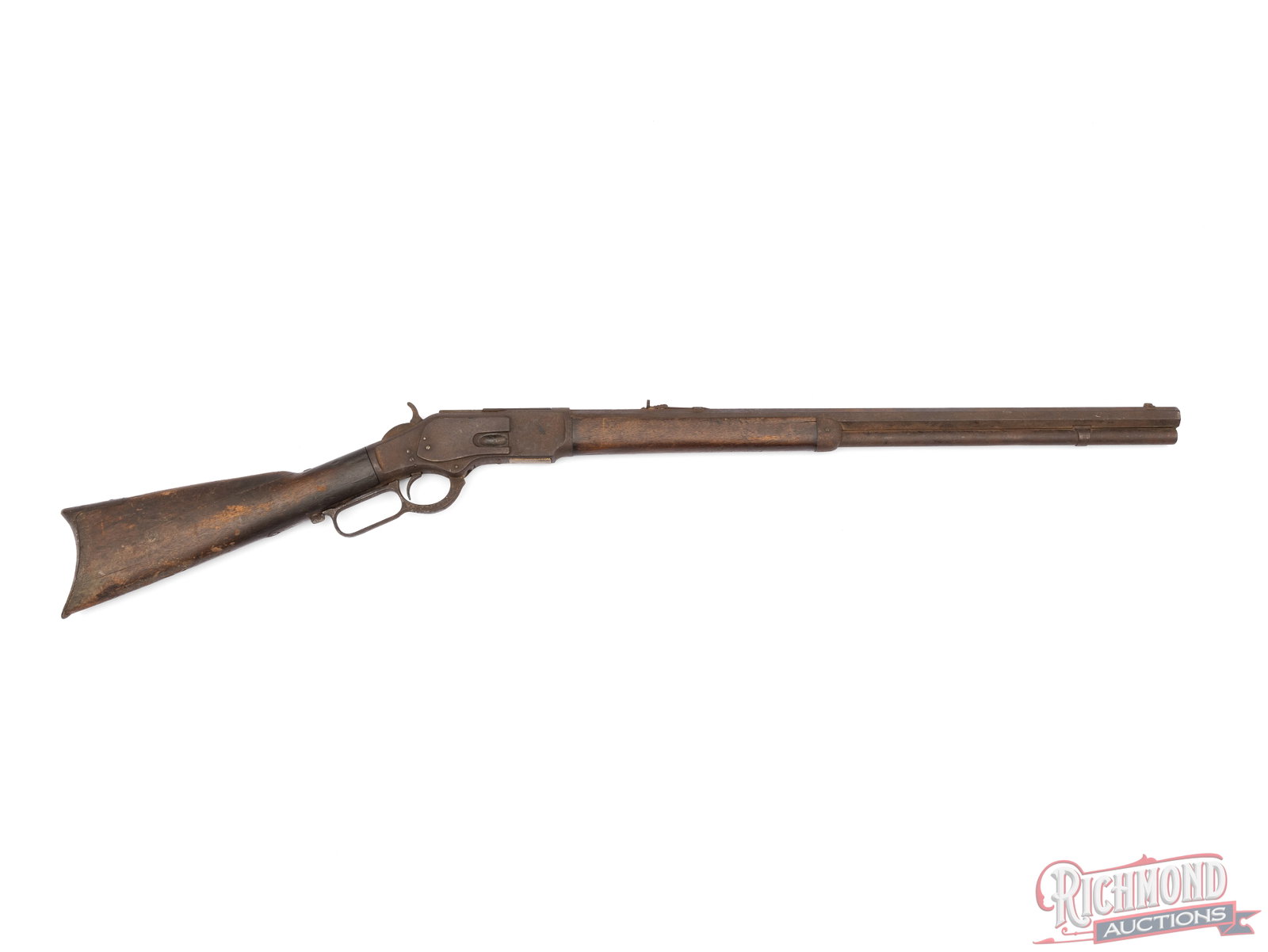 Antique Wallhanger Winchester Model 1873 Lever Action Rifle .44-40 Caliber: This model 1873 lever action rifle was made by Winchester Repeating Arms Co circa 1879. It features a 24" octagon barrel with full length magazine tube, an inverted V front sight and a flat top rear