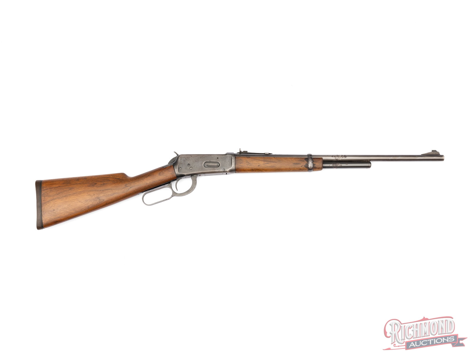 Pre '64 Winchester Model 94 Lever Action Rifle In .30 WCF With 2/3 Mag: Manufactured by Winchester Repeating Arms in 1941. Features a 20" Winchester proof steel barrel with rear elevation notch sight and ramped front blade, missing hood. Rare 2/3 magazine tube. Fitted