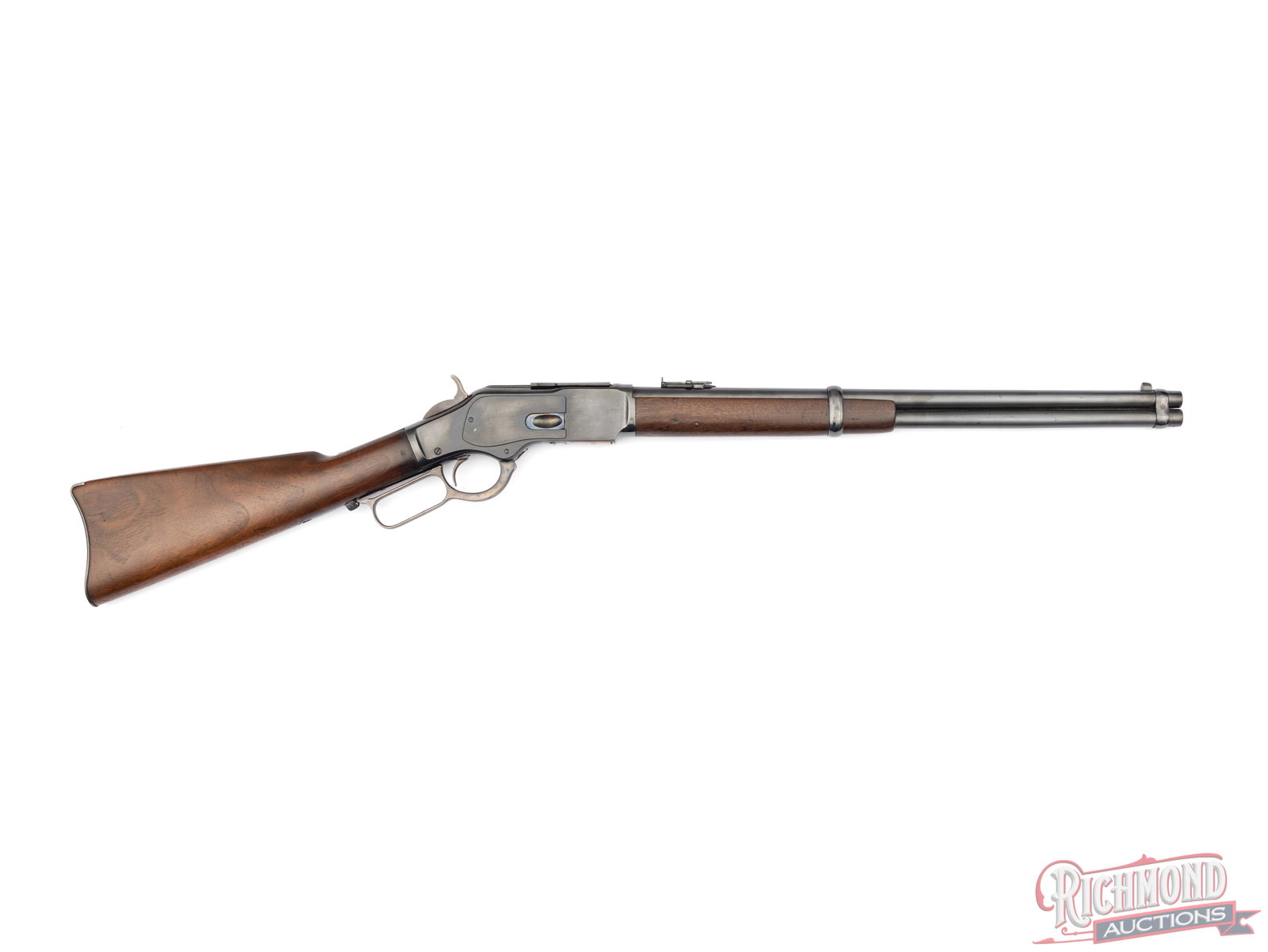 Antique Winchester Model 1873 Saddle Ring Carbine .38 WCF Lever Action Rifle: Manufactured by Winchester in 1889. Features a 20" round barrel with factory rear ladder sight and blade front sight. Barrel is stamped with the King's Improvement patent and two line Winchester