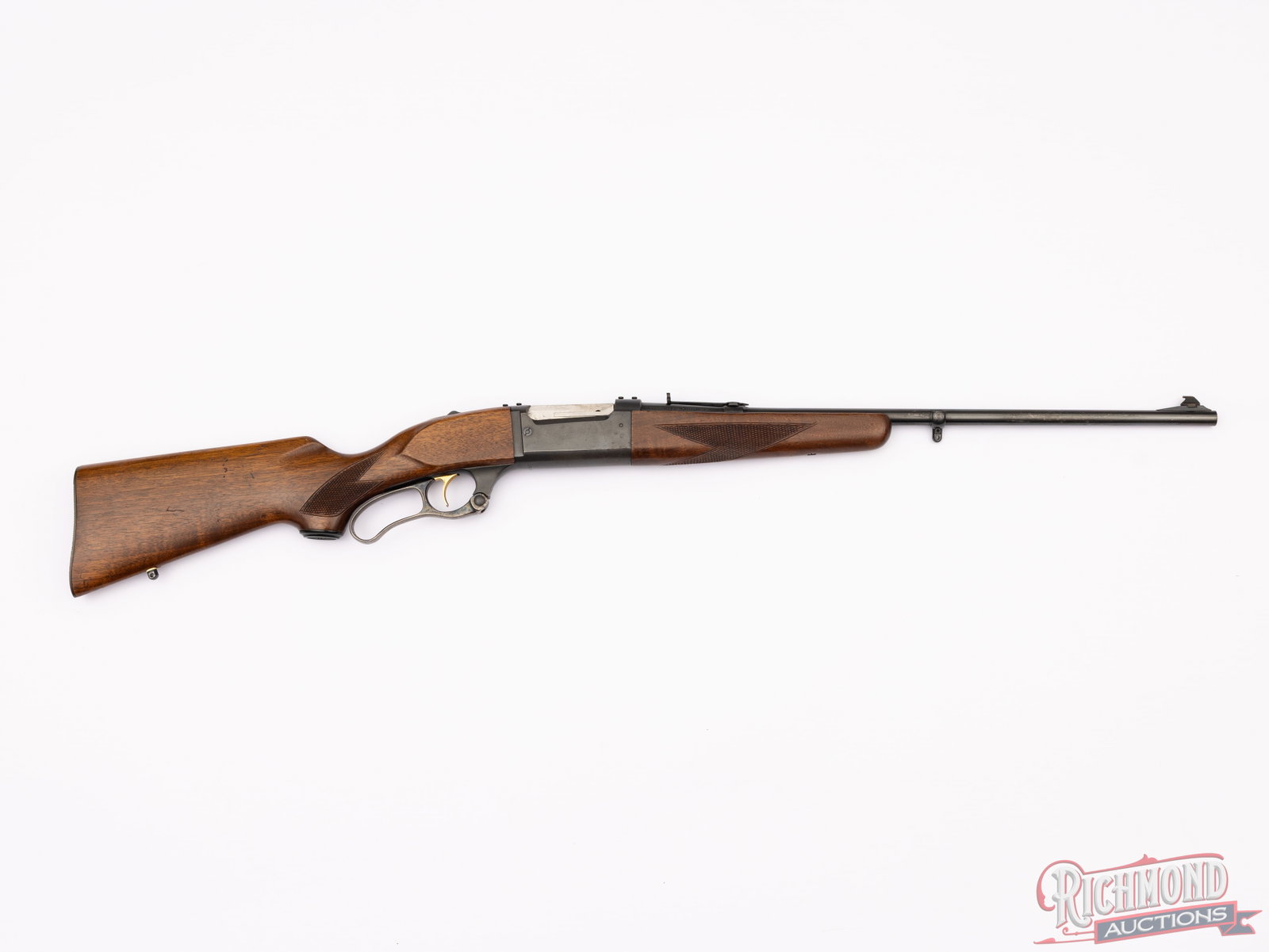 High Condition Savage Model 99F in .300 SAV Featherweight Lever Action Rifle: Manufactured by Savage Arms in 1961. Features a blued 22" round tapered Hi-Pressure Steel Proof Tested barrel with semi-buckhorn rear adjustable sight and blade with brass bead front. Blued solid