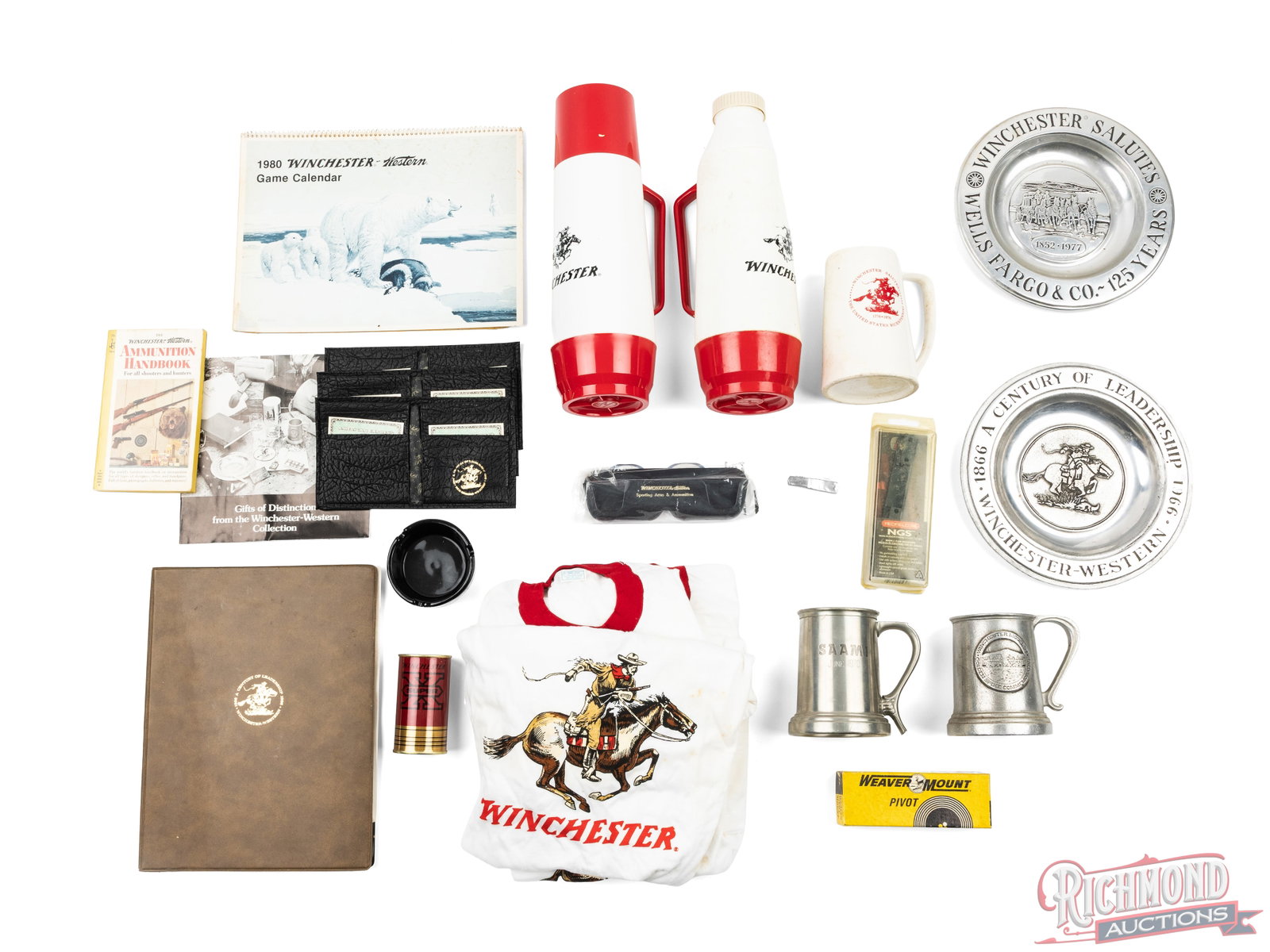 Large Lot Of Winchester Promotional Items And More: This lot contains many various Winchester and Western items, some collectable and some promotional. items included in this lot are 3 leather wallets, an ashtray, an eyeglass rack, a sealed can
