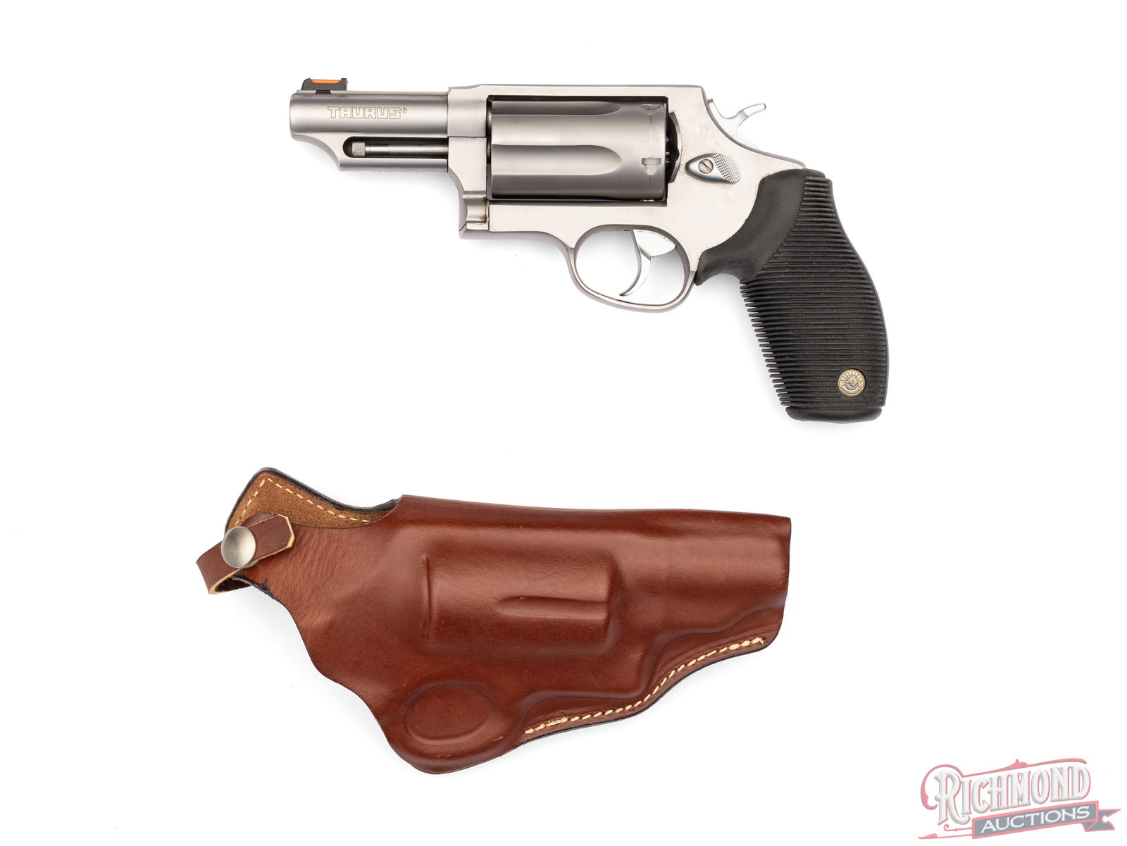 Taurus The Judge .45 Colt / .410 GA Double Action Revolver: Manufactured in Brazil by Taurus Armas. Features a 3" barrel with rear integrated notch and fiber optic front sight. Double/single action with five-round fluted swing-out cylinder. Chambered for .45