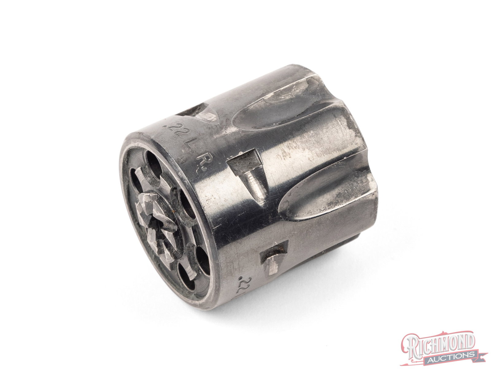 Colt Frontier Scout .22 LR Revolver Cylinder: Six round blued fluted cylinder for Colt Frontier Scout revolver chambered for .22 LR cartridges. Condition GOOD - Some areas of finish loss
