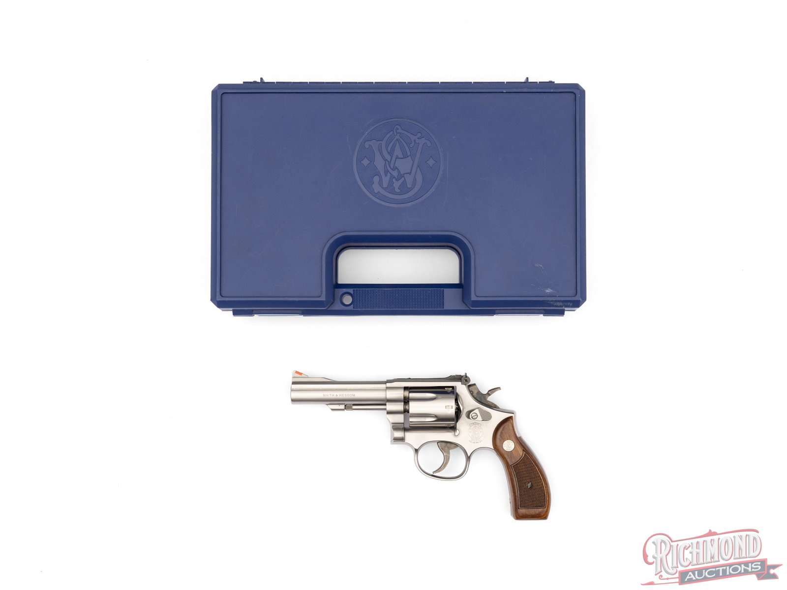 Smith & Wesson Model 67-3 Stainless 4" Double Action .38 SPL Revolver In Original Case: Manufactured by Smith & Wesson in 1997. Features a 4" barrel with rear micrometer adjustable notch and ramped front blade with orange insert. Double/single action with a 6-round swing-out fluted cylin