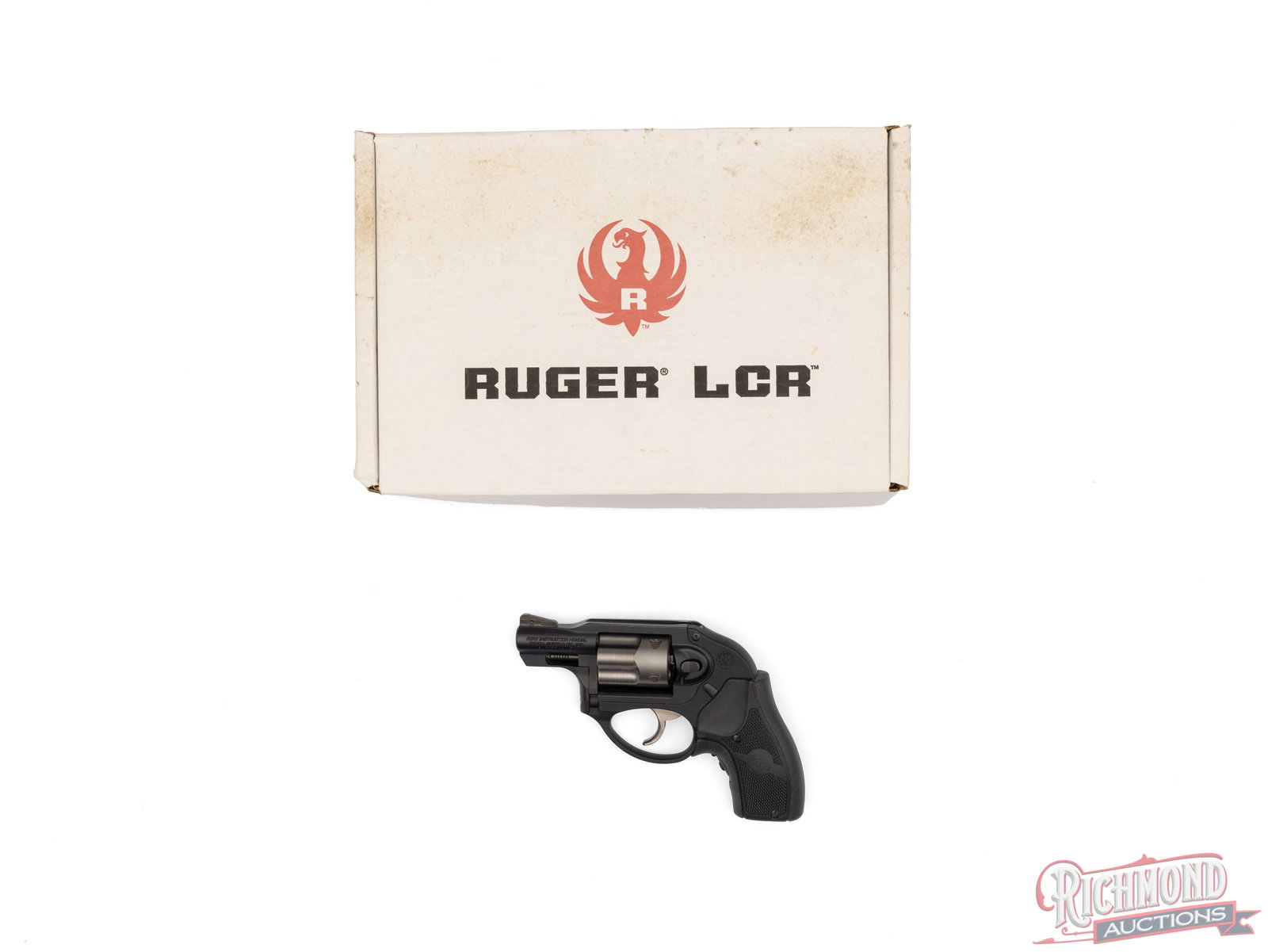 Ruger LCR Crimson Trace .38 SPL+P Lightweight Double Action Revolver In Original Box: Manufactured by Ruger in 2012. Features a 2" barrel with rear integrated notch and serrated ramped blade front sights. Double action only with a shrouded hammer and a five shot extensively fluted cyli