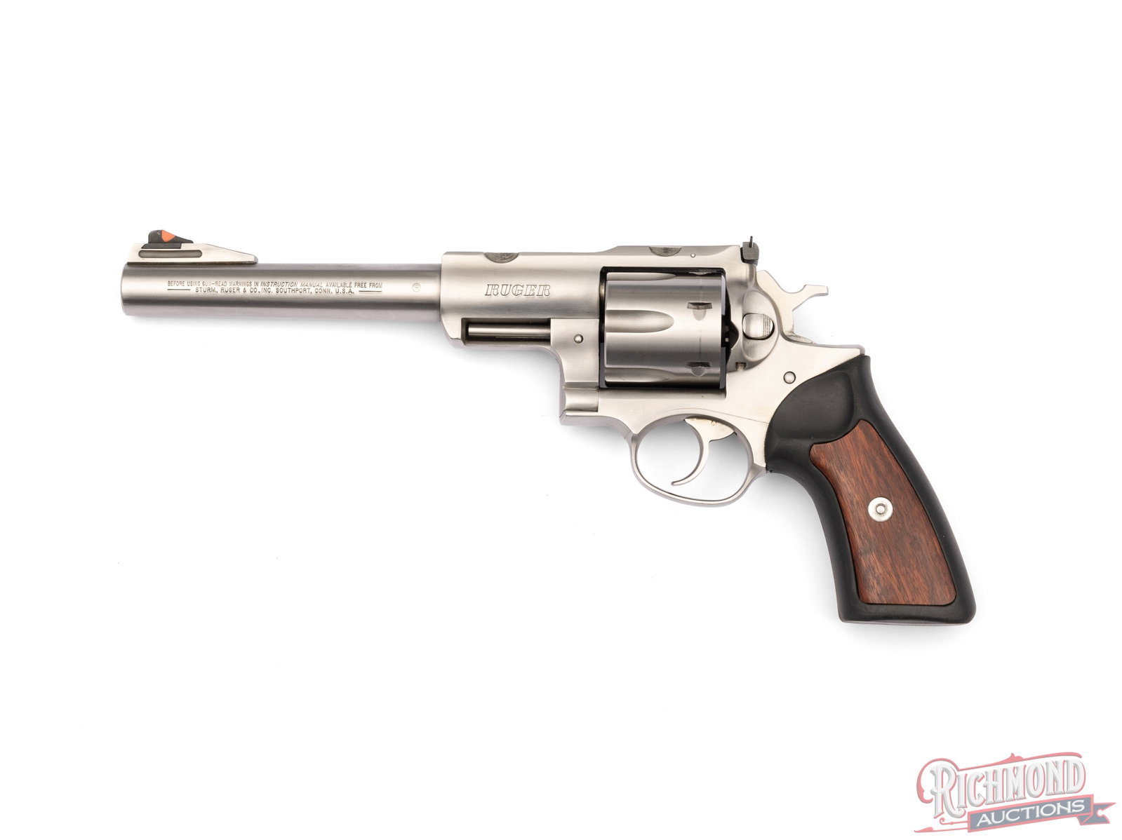 Ruger Super Redhawk Double Action Revolver 7 1/2" Barrel .44 Magnum: This double action revolver was made by Ruger in the USA and is chambered in .44 Magnum. It features a 7 1/2" barrel with an orange ramp front sight and square notch rear sight. It is fitted with a 6