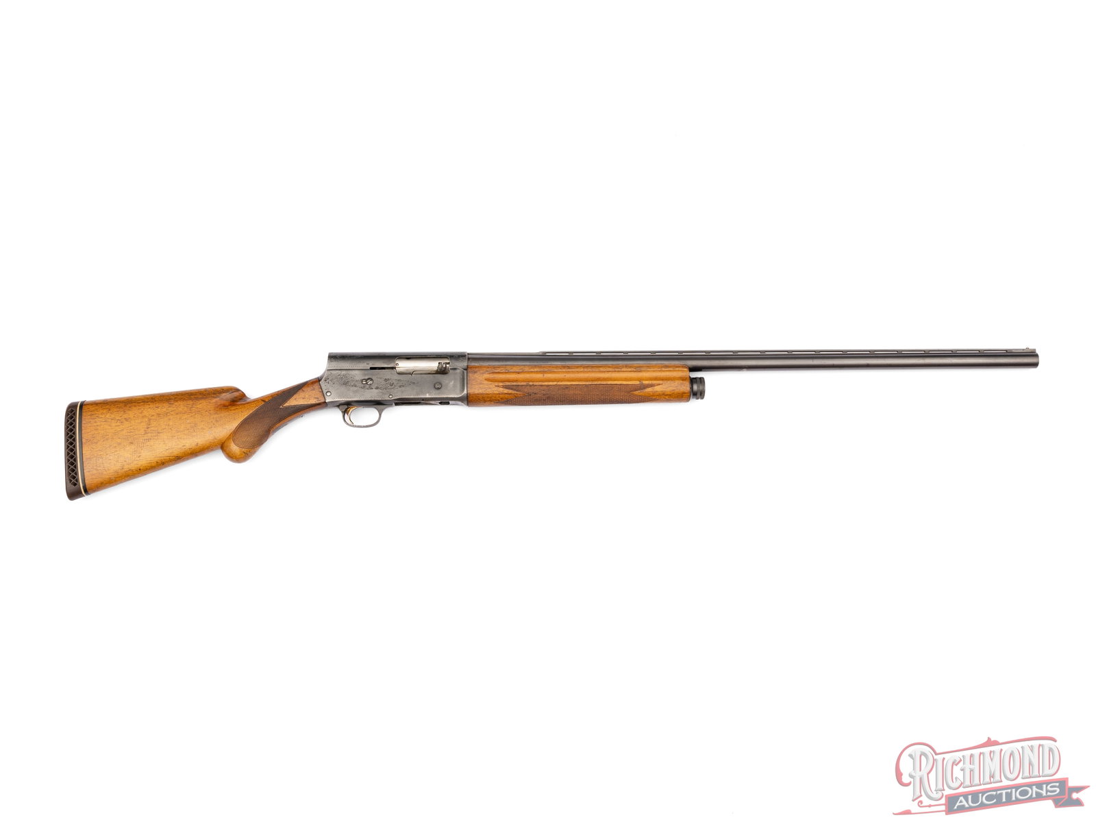 1965 Browning A-5 Light Twelve 12 GA Semi-Auto Shotgun Ventilated Rib: Manufactured by FN for Browning in 1965. Features a 29" blued raised ventilated rib barrel with nickel bead front sight and Improved Modified choke. Semi-auto action with Grade I engraving, gold