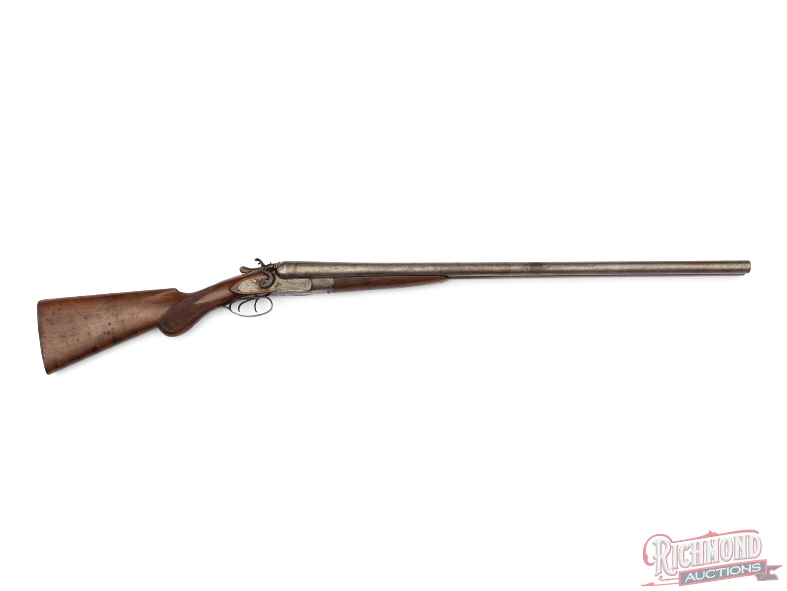 John S. Lovell and Sons Marked Side By Side Hammer 10 Gauge Shotgun: Made for John S. Lovell and Sons of Boston, Massachusetts in England by an unknown company circa 1880. Fitted with 30" Damascus steel barrels with bead sight and matted rib marked "Prize Gun". Case
