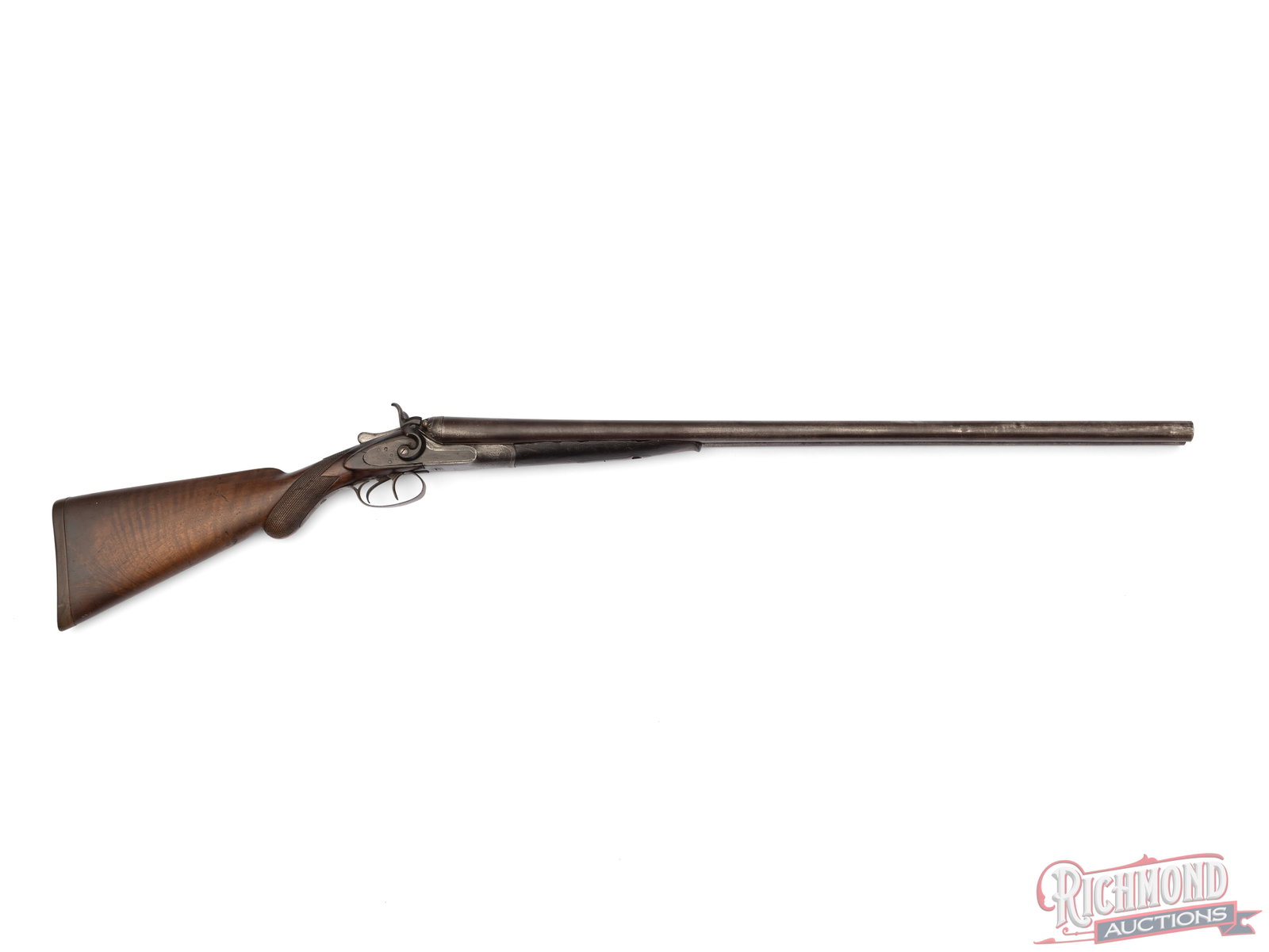 W.W. Greener Side By Side Hammer 10 Gauge Shotgun: Project W. W. Greener 10 Gauge Hammer side by side shotgun with 30-3/4" Damascus steel barrels with concave smooth rib marked with Greener Address and "The Trap Gun" model marking. Scroll engraved