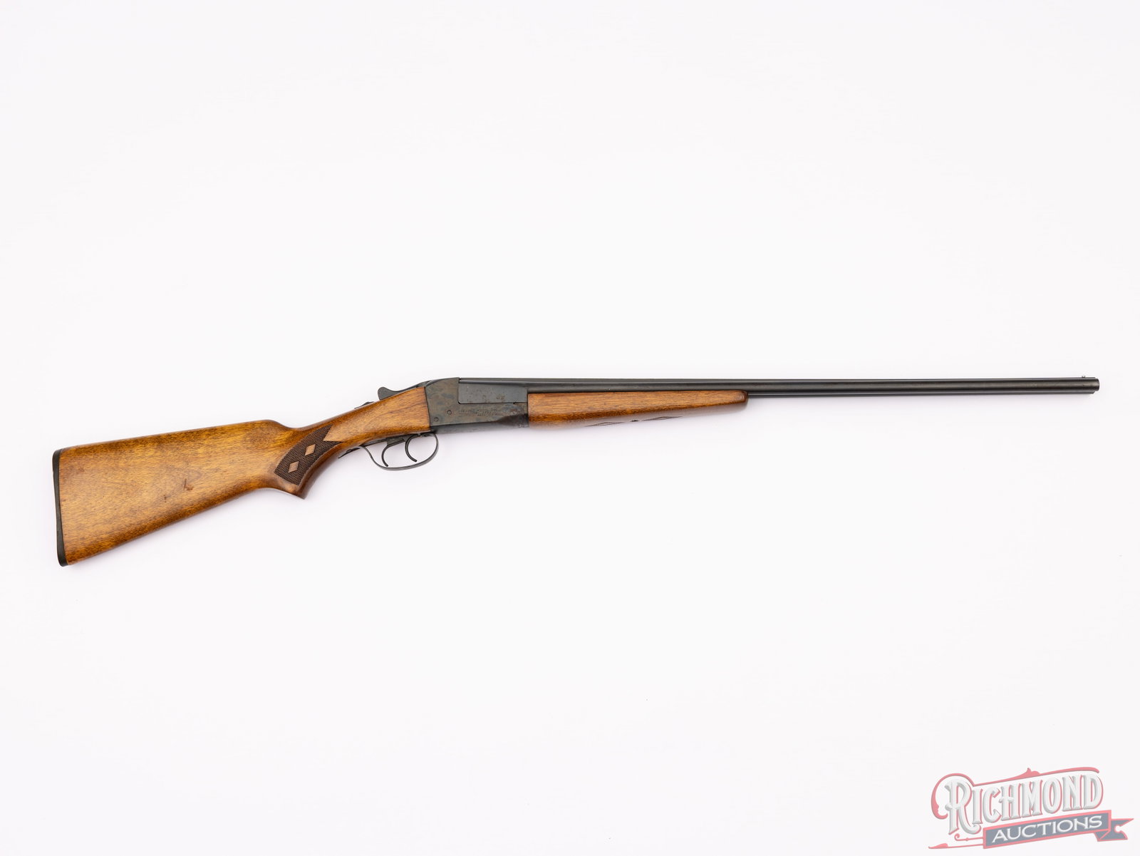 Stevens / Savage Model 311C SxS .410 GA Side by Side Shotgun: Manufactured by Savage/Stevens in Westfield, Massachusetts. Gun has 26" blued solid rib Selected Forged Steel barrels with 3" chambers, raised matted sighting plane with bead sight and extractors in