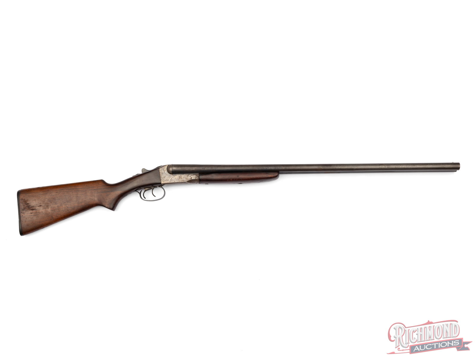 Stevens Model 311A Side by Side 12 Gauge Shotgun: Made by Savage Arms Company circa 1955. Shotgun has 30" Selected Forged Steel Barrels with 2-3/4" chambers, Full and Modified chokes in 12 gauge with extractors. Case hardened boxlock frame with two
