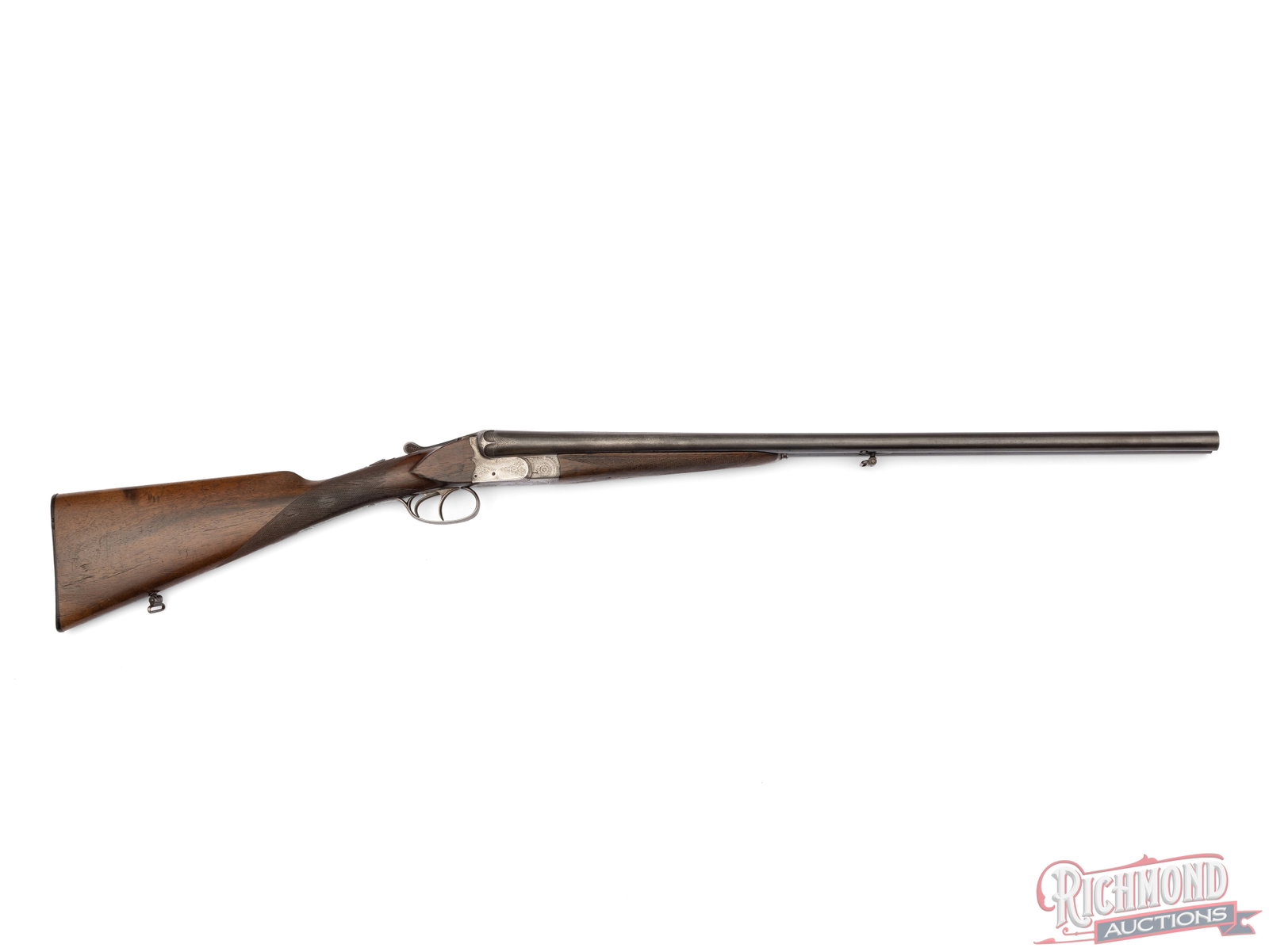Pre-War Belgian 20 Gauge Side by Side Shotgun: Made in Liege, Belgium circa 1930. Blued 25-1/2" Acier Steel barrels with raised matted rib, ejectors, bead front sight, Modified and Cylinder chokes, 3" chambers in 20 Gauge. Case hardened scroll