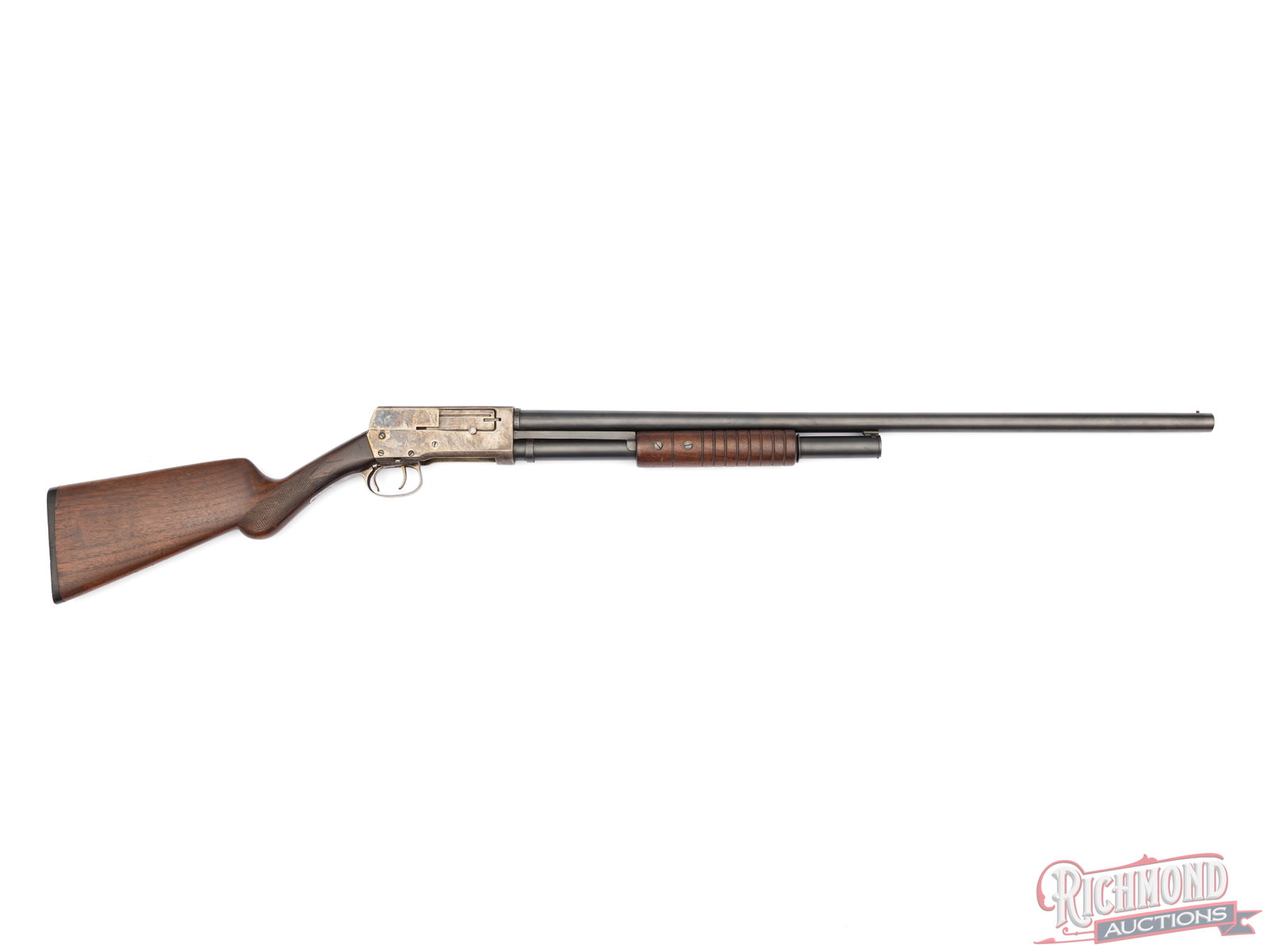Scarce Union Arms Co 30" Pump Action Shotgun in 12 Gauge: Manufactured by The Union Arms Co in Toledo, OH for Sears Roebuck in the early 1900's. Features a 30" blued barrel with brass bead front sight and Full choke. Case hardened receiver. Pump action with