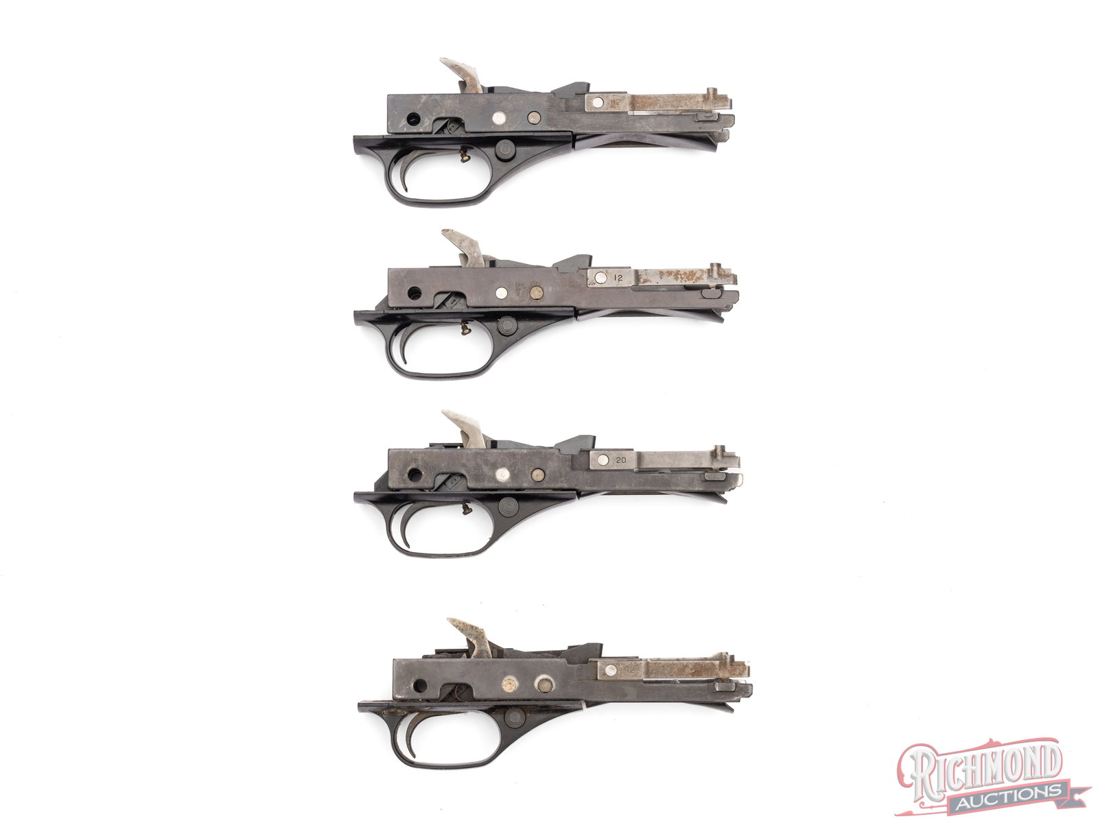 Four Winchester Shotgun Trigger Groups: This is a lot of 4 identical looking trigger groups for Winchester shotguns. Mechanics seem to function properly. Condition VERY GOOD