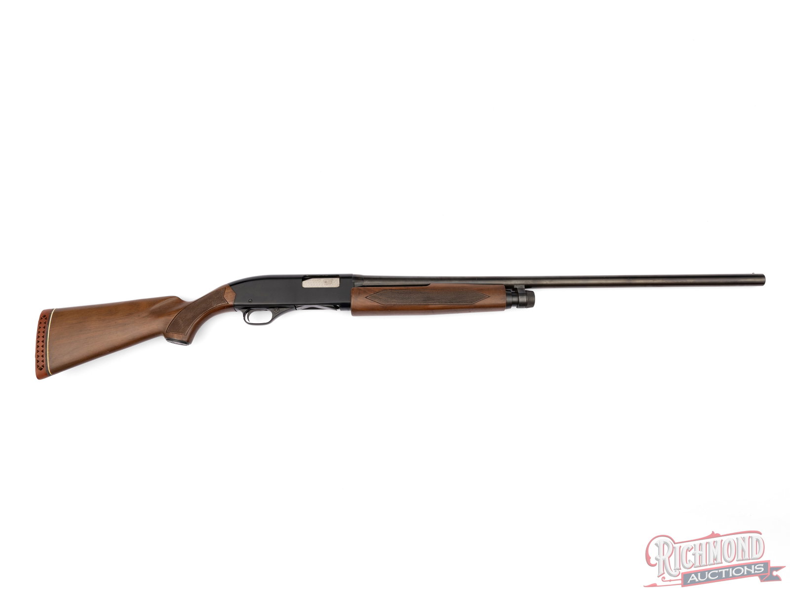 1972 Winchester Model 1200 Pump Action Shotgun in 12 Gauge: Manufactured by Winchester in 1972. Features a 28" blued Winchester proof steel barrel with nickel bead front sight. Chambered for 2-3/4" shells with a Modified choke. Pump action with blued