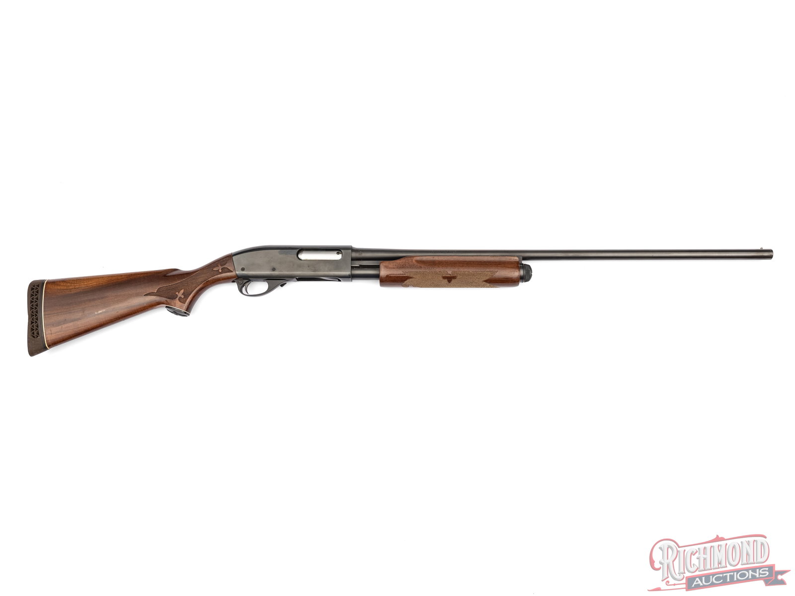 Remington Arms 20 Gauge Wingmaster 870 Pump Action Shotgun 28": Manufactured by Remington Arms in November 1978 according to date code "RQ". Features a 28" blued barrel with nickel bead front sight. Chambered for 2-3/4" shells with a Modified choke. Pump action,
