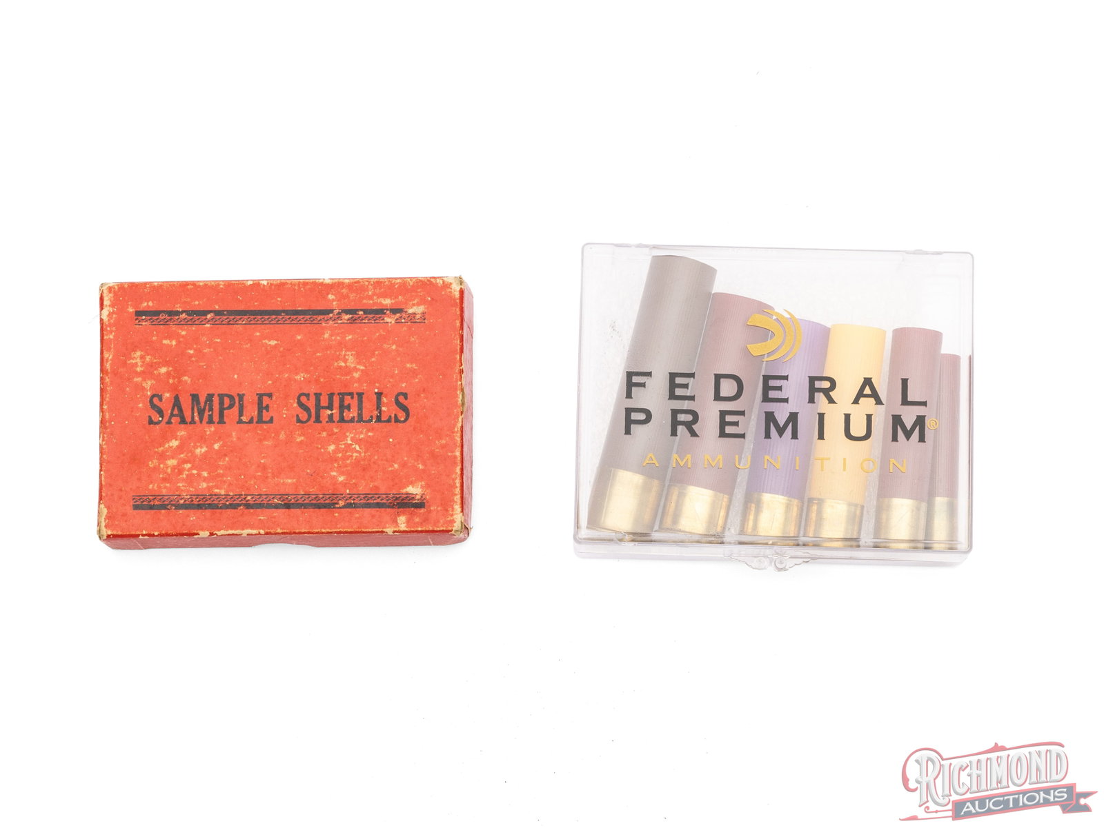 Federal Paper Shell Cutaway Sample Shell Box And Plastic Sample Shells: These two sample boxes were made by Federal Cartridge Corp. One box is a 12 gauge sample box 12 gauge cutaway paper shells. It is a red two piece box with "Sample Shells" printed on the top and