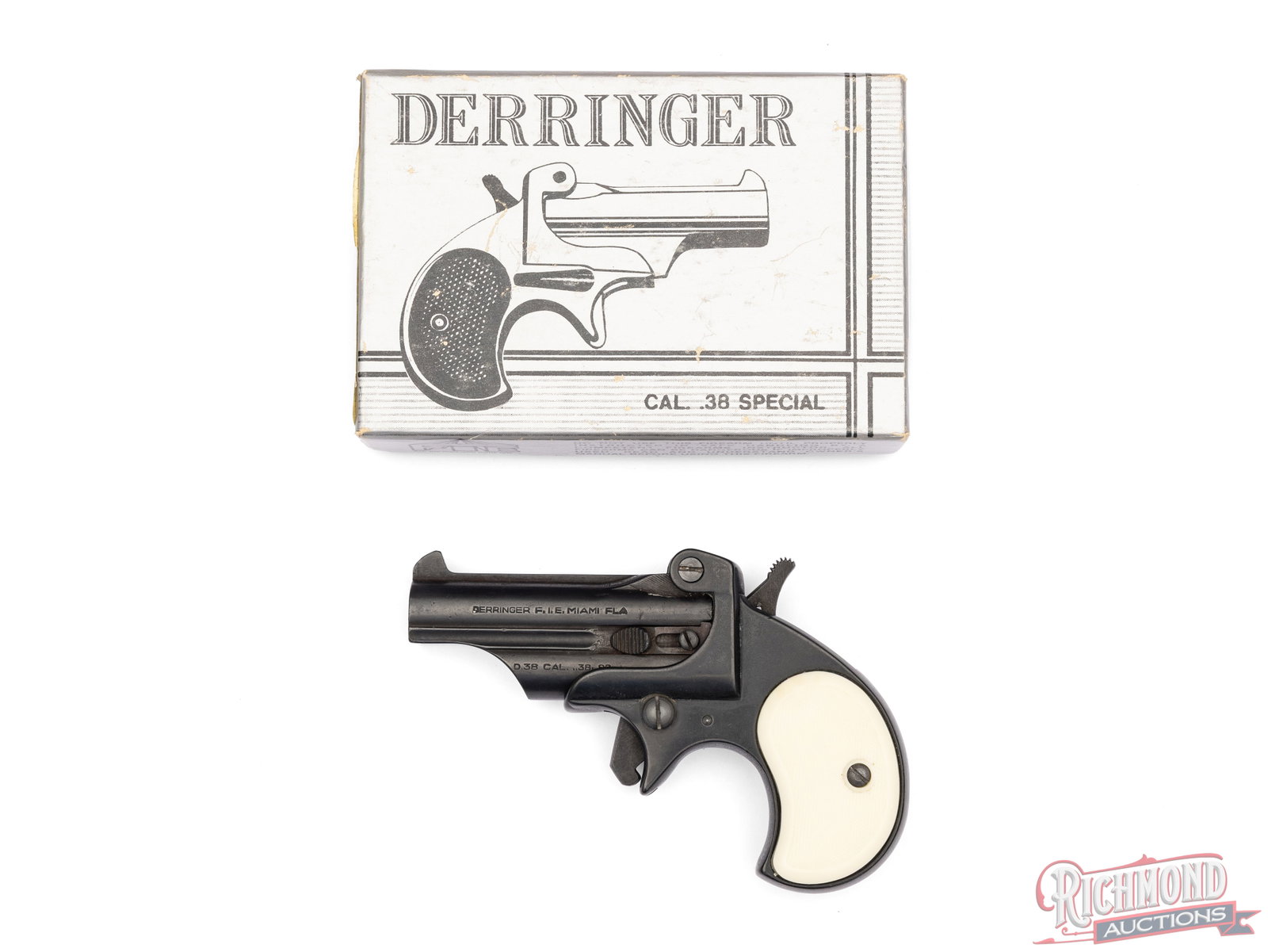 FIE Model D86 Derringer .38 Special Single Shot Pistol in Original Box: Manufactured by FIE in Miami, FL. Features a 2-7/8" barrel with rear notch and blade front sight. Single shot with spur trigger and hammer. Storage for another round under the barrel. Matte blued