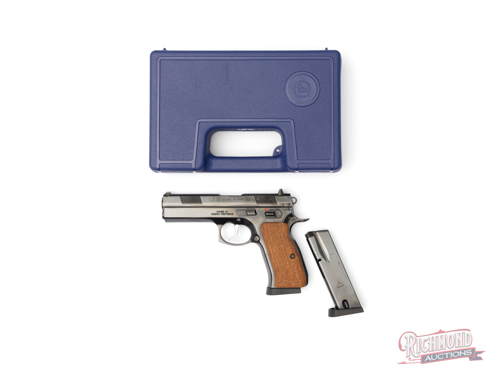 Early Version CZ Model 97 B Blued .45 ACP Semi-Automatic Pistol In Original Box: Manufactured in Czech Republic for CZ USA around 2000. Features a 4-1/2" barrel with 3-dot dovetailed sights. Double/single semi-automatic action with the early version manual safety. Bright blued