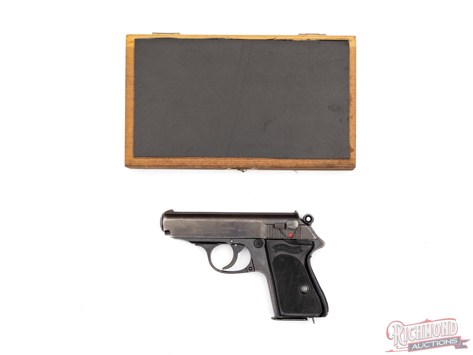 Rare WWII Era Walther PPK in .22 Cal Semi-Automatic Pistol: Manufactured by Walther in 1941 and one of a very small number of PPK pistols chambered in .22 Long Rifle. Features a 3-1/4" barrel with rear notch and low profile blade front sight. Double/single