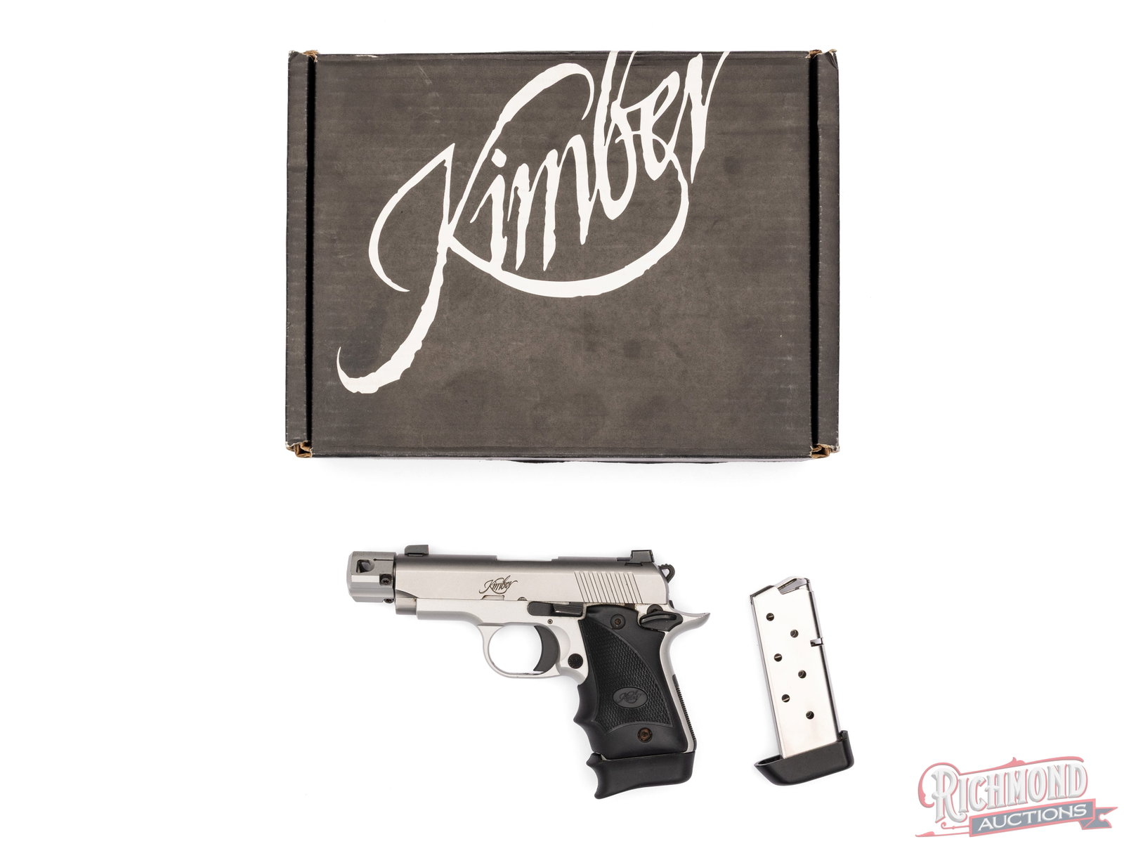 Kimber Micro 9 Threaded Stainless 9mm Semi-Automatic Pistol: Manufactured by Kimber in Troy, AL. Features a 3-1/4" threaded barrel with compensator and TruGlo Tritium 3-dot night sights. Semi-automatic single action with manual thumb safety and serrated