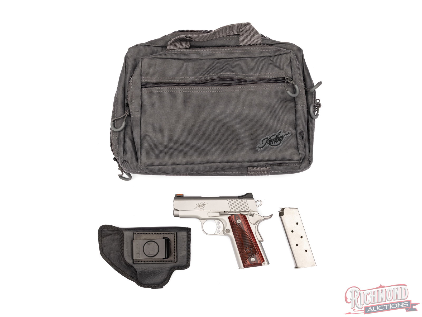 Kimber Stainless Ultra Carry II .45 ACP Compact 1911 Semi-Auto Pistol in Original Box: Manufactured by Kimber in Troy, AL. Compact 1911 style pistol features a 3" with a dovetailed notch rear sight and fiber optic front sight. Single semi-automatic action with manual and grip safety,