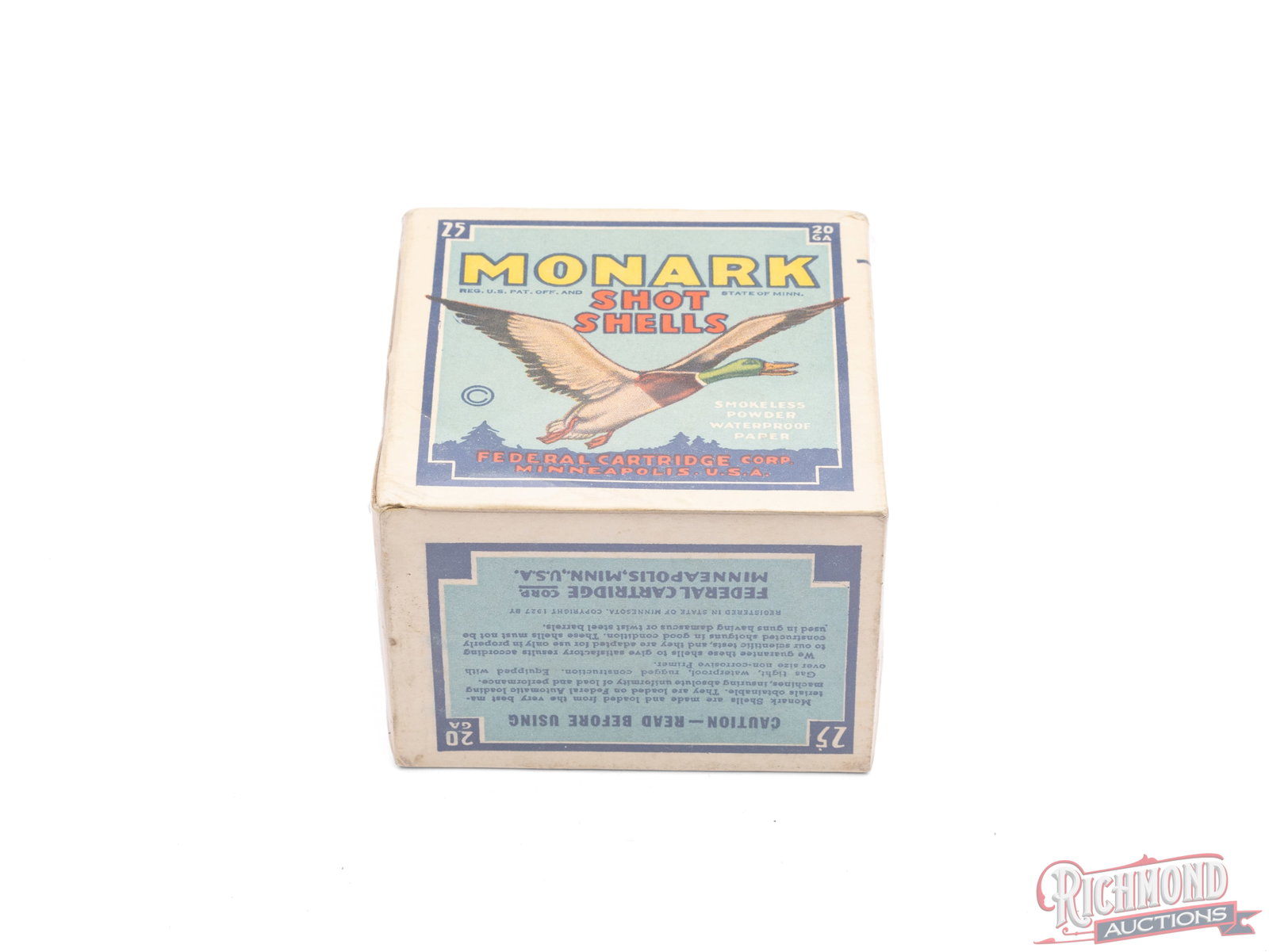 Federal Monark 20 Gauge Shot Shells Collector's Box: This is an empty box of 20 gauge Monark shot shells made by Federal Cartridge Co. The box features a bright blue label with mallard duck graphic with the call out "Smokeless Powder, Waterproof Paper".
