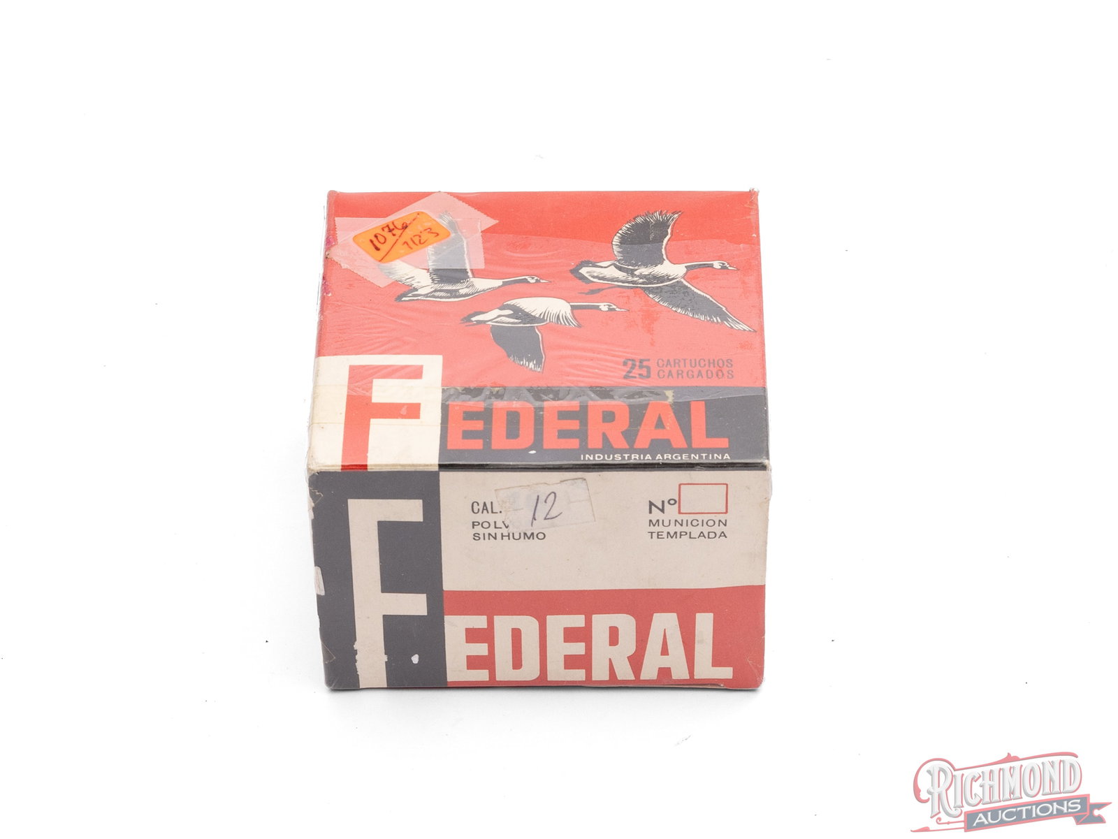 Federal 12 Gauge Argentina Labeled Shot Shell Collector's Box: This is an empty one piece box of 12 gauge shells with the Federal Industria Argentina brand. The bright red box shows the graphic of flying geese and features the "Spreafico" emblem. Condition VERY G