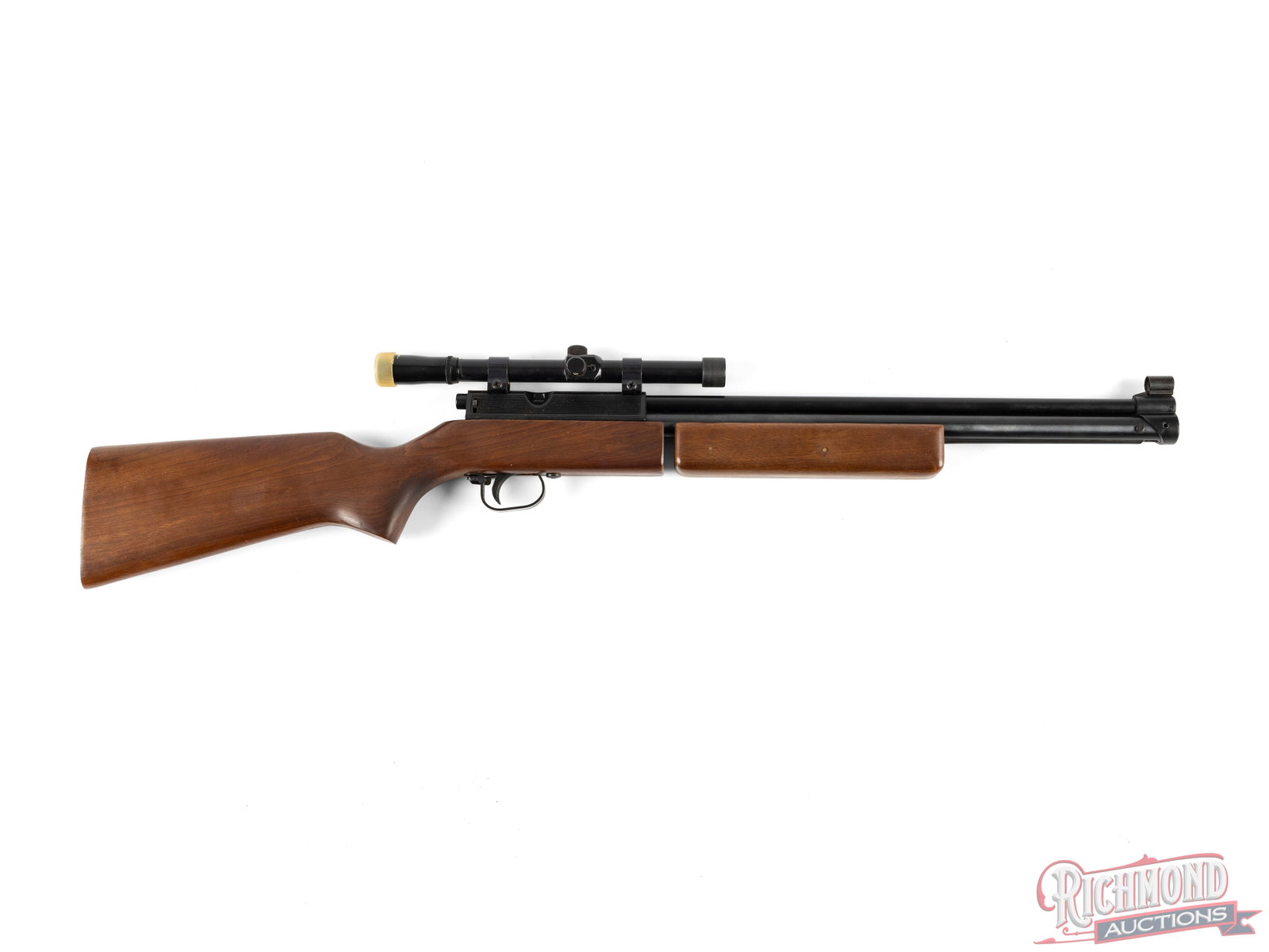 Sharp-In Nova Scoped .177 Caliber Air Rifle: Made by Sharp-INova in Japan circa 1980 with blued .177 caliber pump action with mounted crosshair 4x H&R marked scope. Plain walnut stock with plastic hardware. CALIBER/GA: .177 Cal. Condition GOOD w