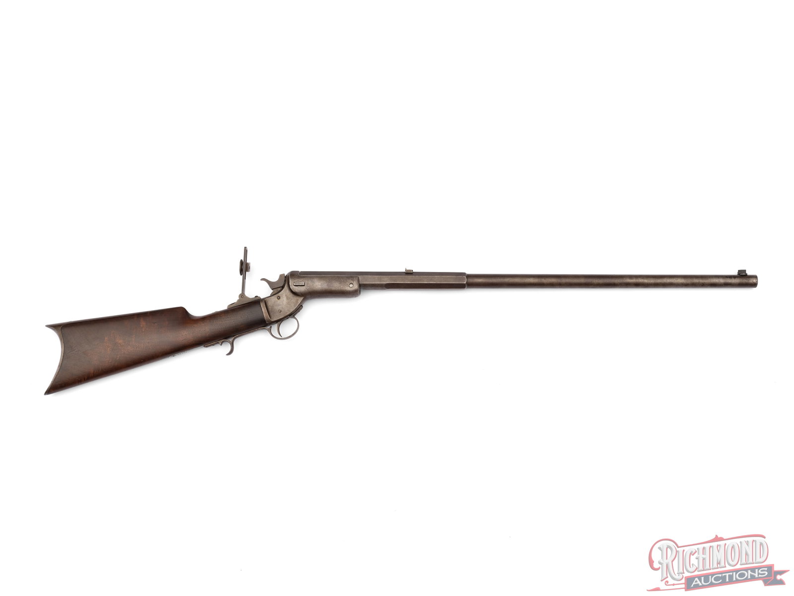 Antique J. Stevens Tip Up Model Single Shot Rifle .25 Caliber: This Tip Up model rifle was made by J. Steven Co. between 1870 and 1895. It measures as a .25 caliber, but caliber is not marked on the barrel. It features a 26" round/octagon barrel with a dovetail