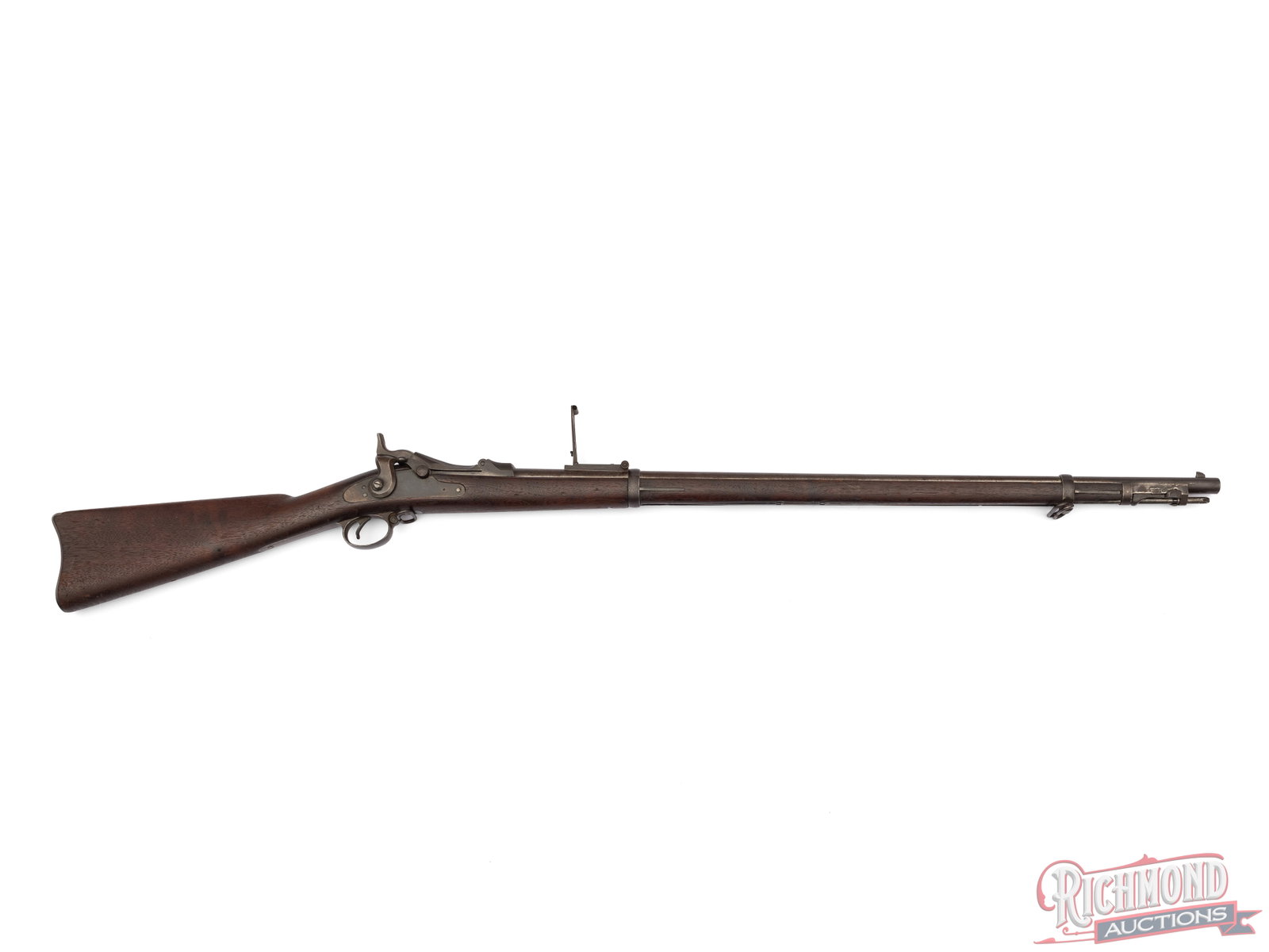 1891 Springfield Model 1884 Trapdoor Single Shot Rifle With Rod Bayonet .45-70: This Springfield Model 1884 was built in 1891 and is chambered in .45-70. It features a blade style front sight and a Buffington rear sight. The walnut stock houses the cleaning rod bayonet, is
