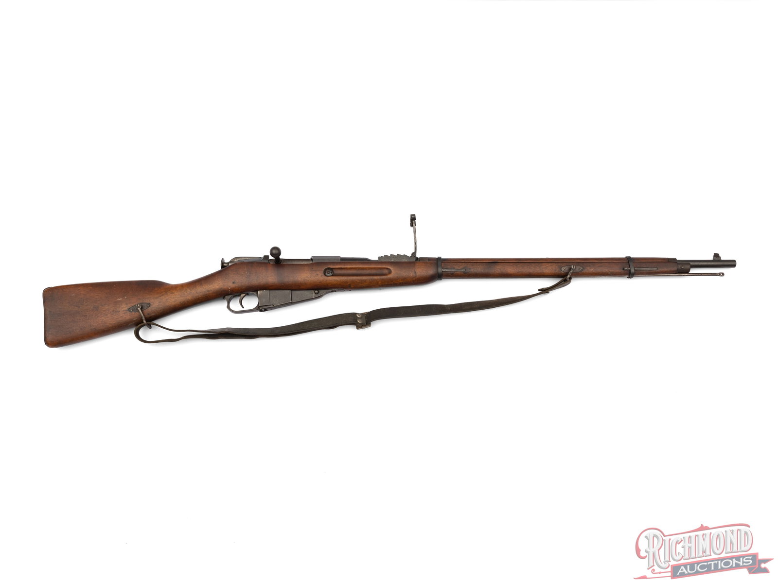 Finnish Capture Soviet Dragoon Mosin Nagant Bolt Action Rifle 7.62x54R: This Mosin Nagant rifle was made by the Izhevsk factory in 1930, and later reworked by Finland. It is fitted with a blade style front sight and an adjustable rear sight with remarked measurements for
