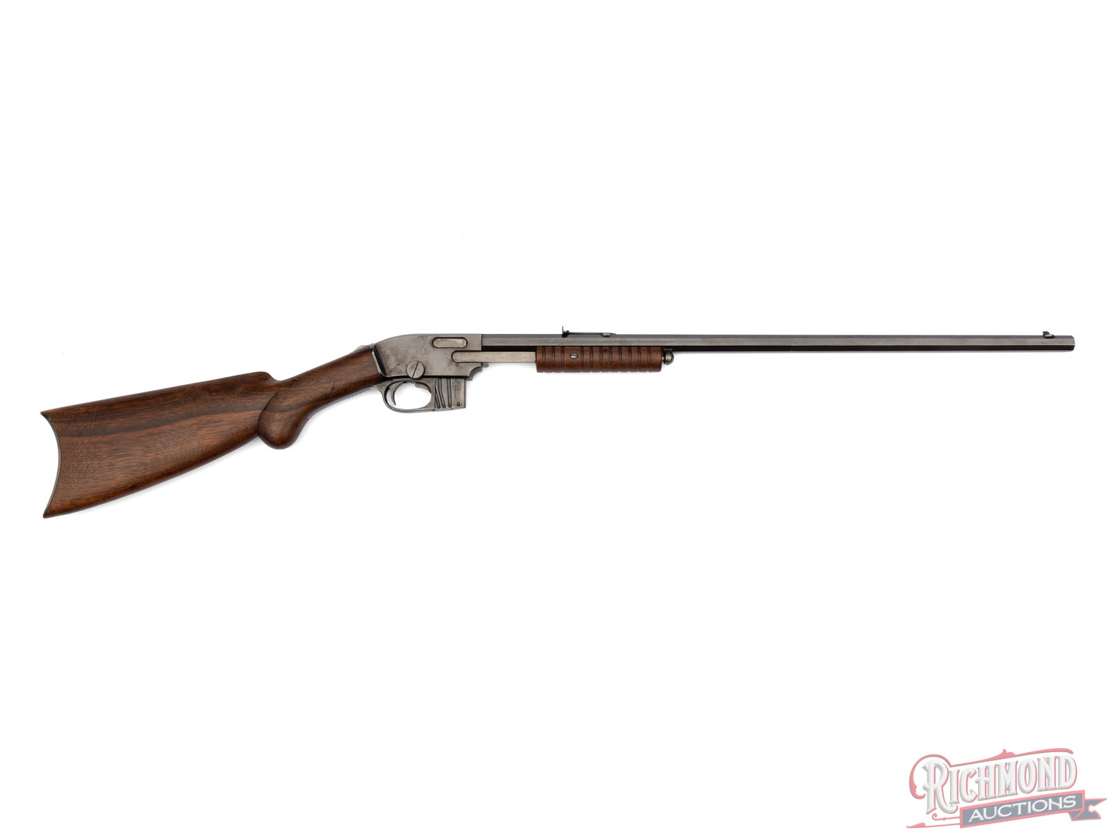 High Condition Savage Arms Model 1903 Slide / Pump Action .22 S/L/LR Rifle: Manufactured by Savage Arms Co in Utica NY around 1910. Features a 24" blued octagon barrel with rear notch and dovetail blade front sight. Two-line Savage address stamped on the top barrel flat.