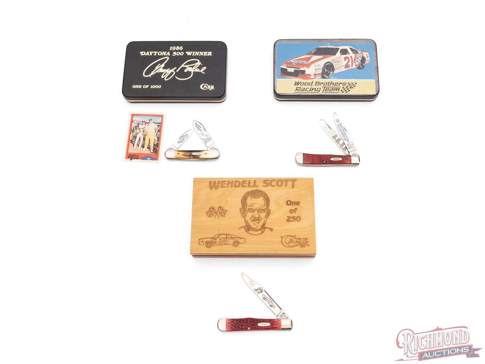 Three Case XX Nascar Commemorative Folder Knives in Original Cases: Lot includes a model R6111-1/2 SS Wendell Scott folder with a single etched blade and red jigged bone handle. One of 250 produced, comes in the original wood case. One model DR6254 SS Wood Brothers Ra