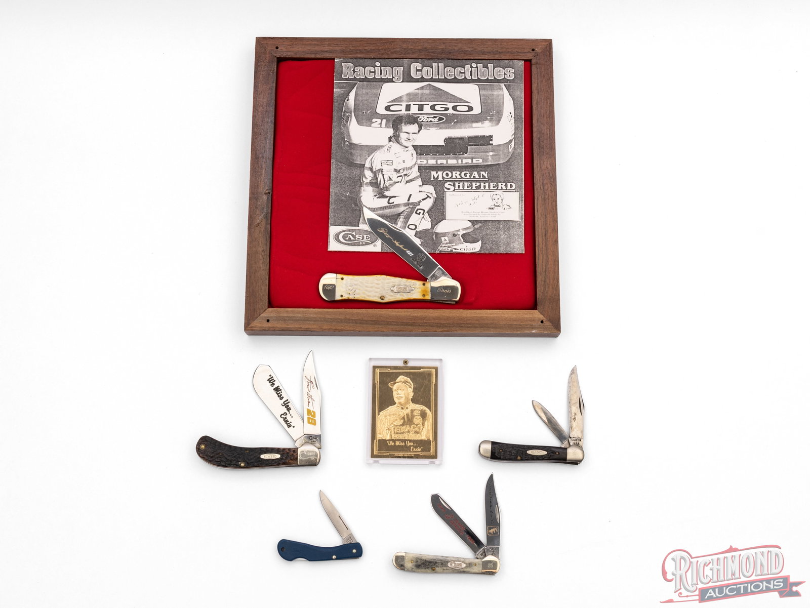 Five Case XX Collector Folder Knives Nascar Commemorative Lot: This lot includes 5 Case XX folder knives. Wood and plexi-glass display includes a Morgan Shepard commemorative folder knife with jigged bone handle and engraved blade with a photo copy picture. Case 