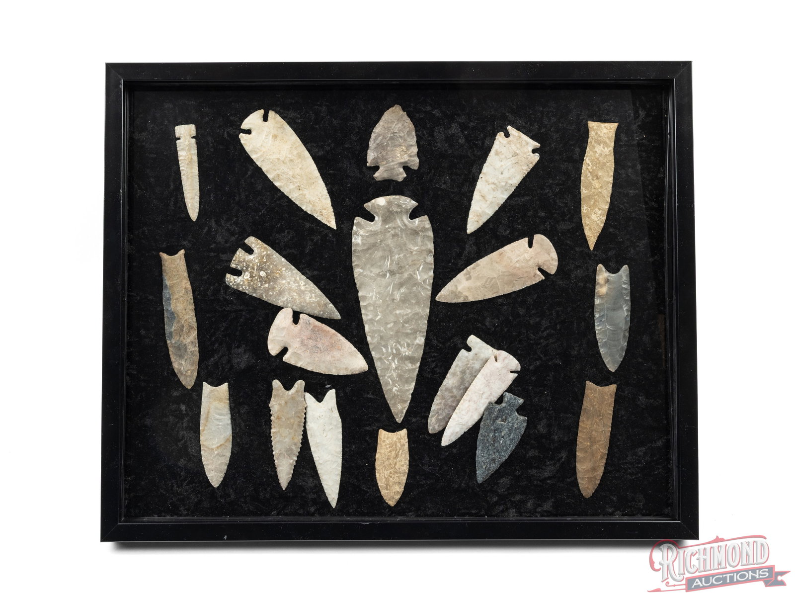 Collector Display of 19 Assorted Native American Arrowheads: This framed display has 19 different types of stone arrowheads that range from 2 1/2" to 8" long. There are several types of types of stones represented in this collection. Great collector set with