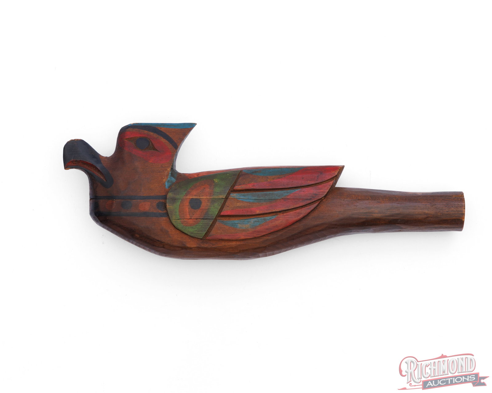 Pacific Northwest Native American Bird Effigy Wood Carved Ceremonial Rattle: This bird effigy ceremonial rattle is likely of the Pacific Northwest tribes. Wood carved bird with colorful painted areas. Wood was split into two pieces in the median at the point of make to add in