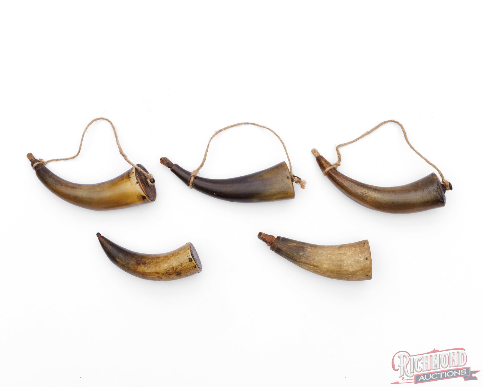 Lot of 5 Vintage Powder Horns: This lot consist of five vintage powder horns. Variable lengths from 5" to 7". Condition GOOD - showing some age.