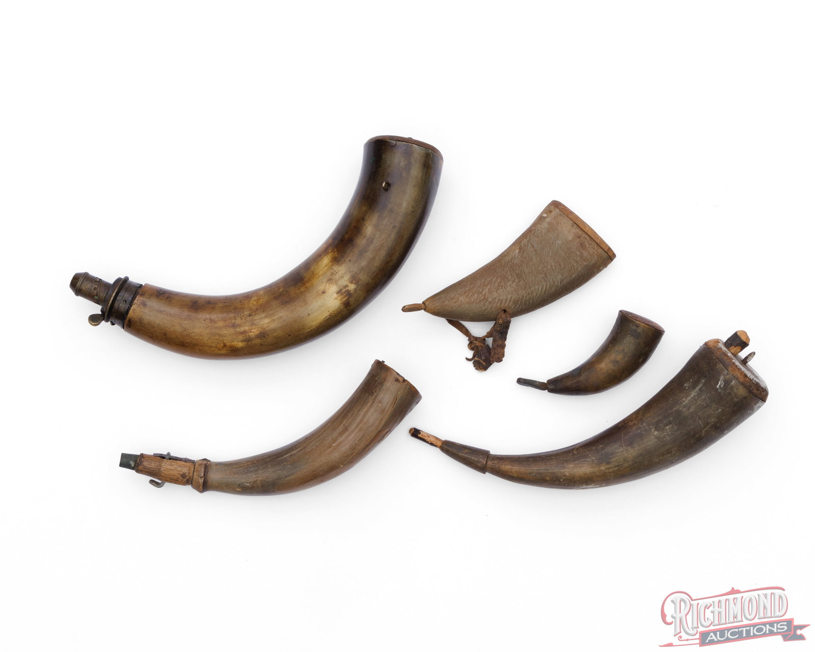 Lot of Five Vintage Bull Horn Black Powder Flasks: These five powder horns range from 3-1/2" to over 12" in length. Each shows some age, a few have some worm holes, small cracks and scratches but overall great display pieces! Condition GOOD