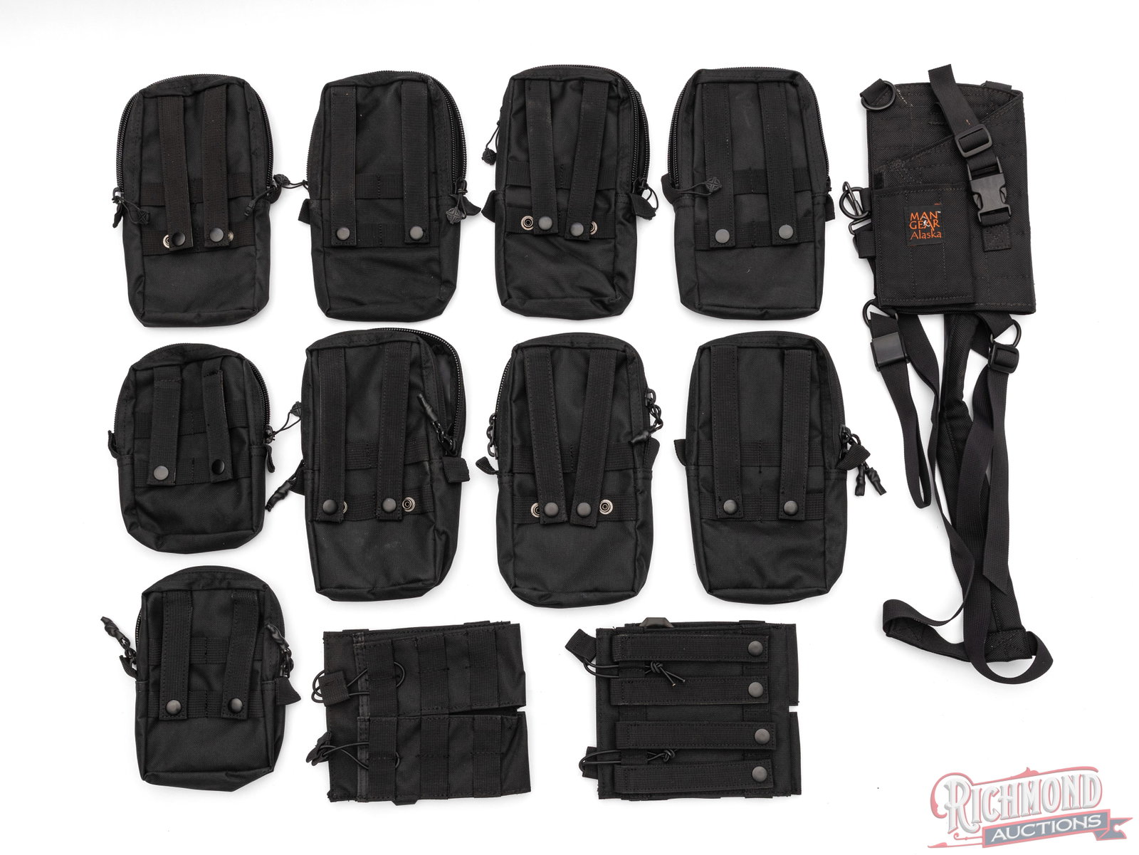 Tactical Molle Pouches & Magazine Carriers With Shoulder Holster: This lot contains black 9 molle pouches, 5 Academy and 4 Redfield, that range 7-10" tall. Also included are 2 double magazine carriers and one Man Gear Alaska shoulder holster for a revolver. All are