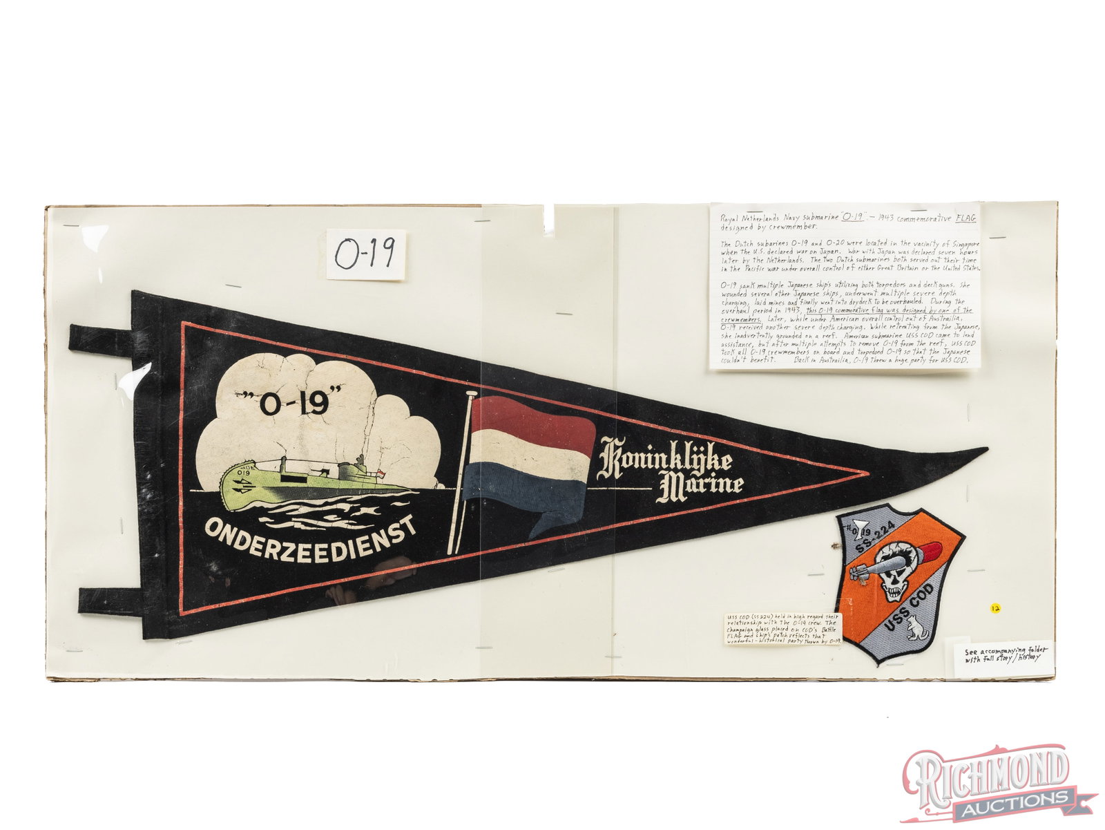 WWII Submarine O-19 Flag And USS Cod SS-224 Patch: This pair of submarine items is of 2 submarines that crossed paths in the Pacific Theatre during WW2. The first item is a crew member designed flag of the submarine O-19 of the Royal Netherlands