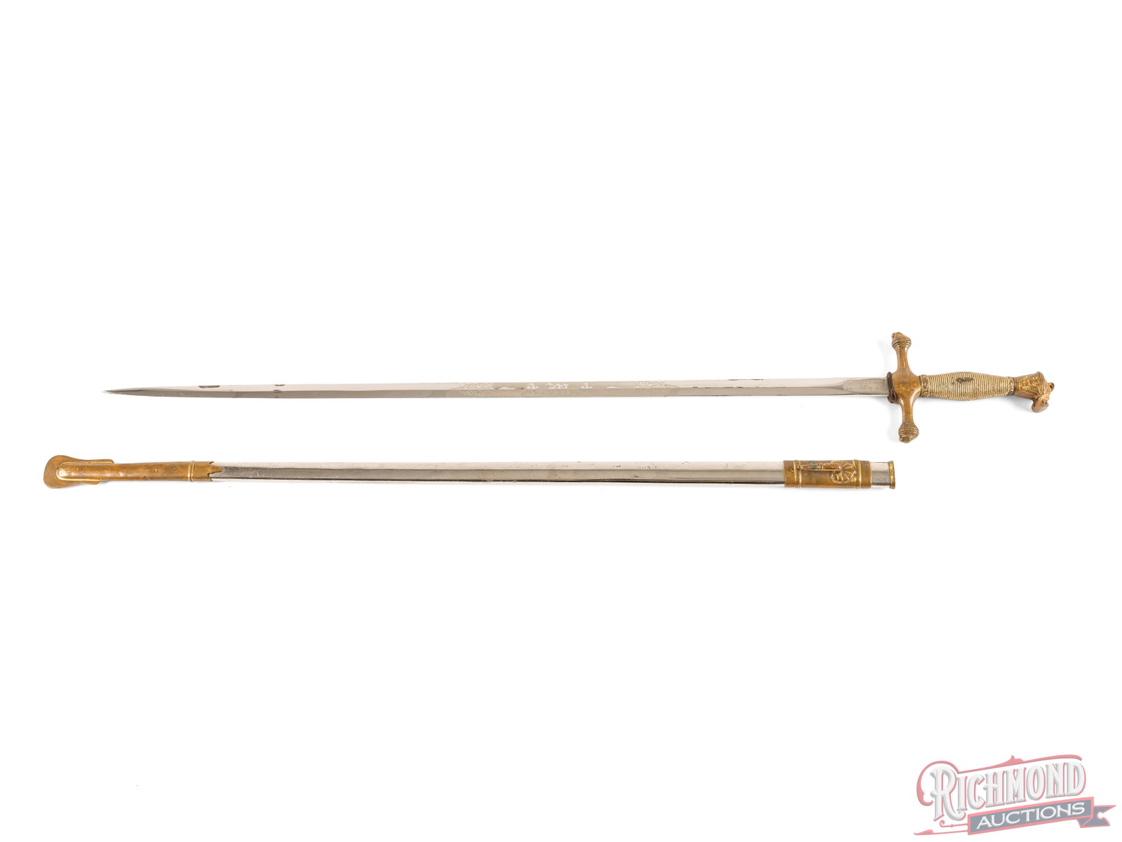 Lilley-Ames Co. Ceremonial Sword Engraved "AMA": This ceremonial sword was likely made circa 1931-1951 by the Lilley-Ames Co. of Columbus Ohio. The sword features a 27 1/2" straight blade and measures 33 1/2" overall. The blade and handguard is