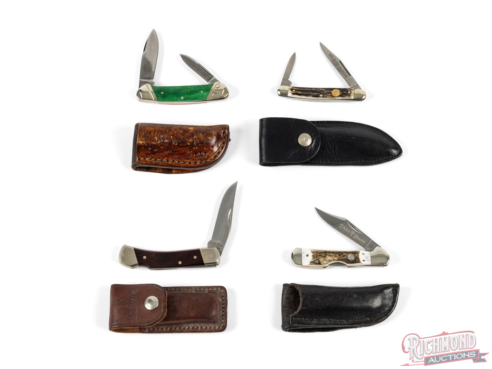 Lot of 4 Folding Knives With Leather Sheaths: In this lot is 2 single blade and 2 two blade folding knives. The first blade is a Schrade Uncle Henry USA with a 3" lockback blade and 6 1/2" overall. The second knife is marked RR-Rough Rider and ha
