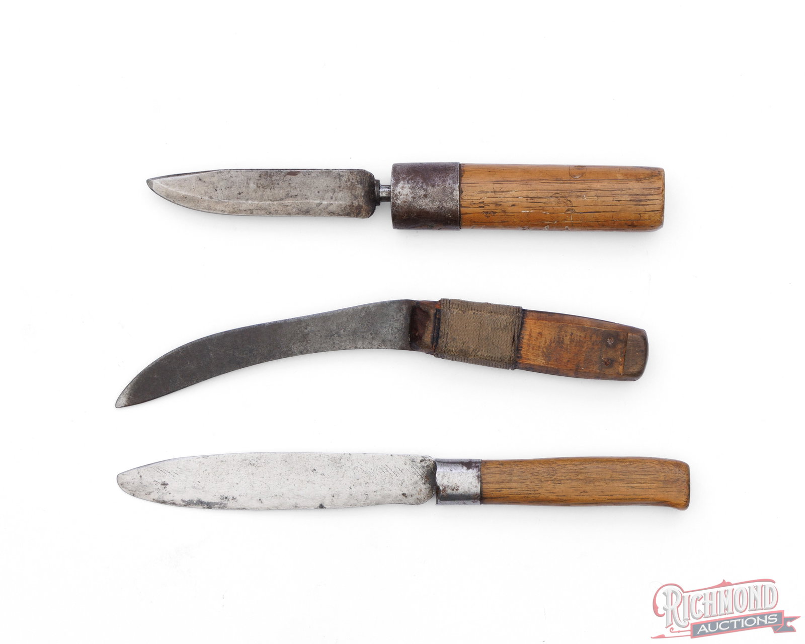 Lot of Three Antique Primitive Fixed Blade Knives: This lot consist of three antique primitive fixed blade knives with wood handles. One blade appears to have been sharpened from file. Lengths range from 9-1/2" to 11" overall. Condition FAIR