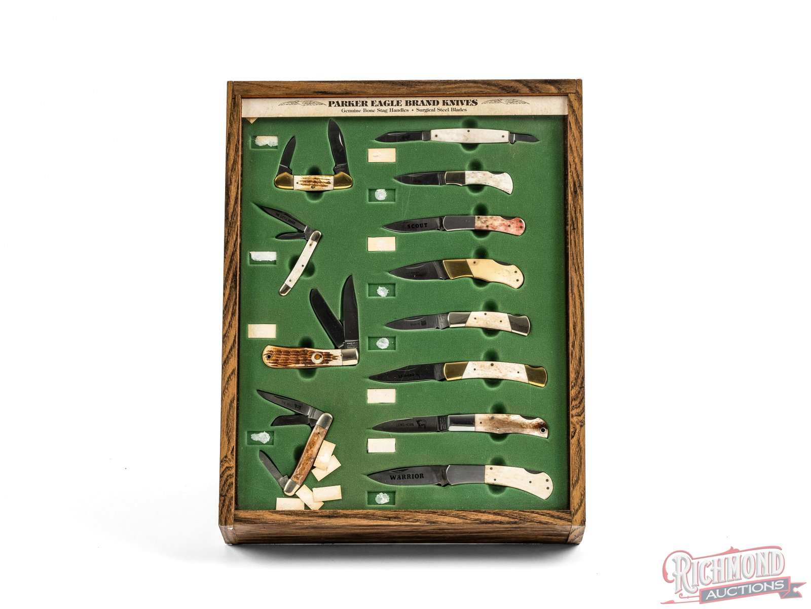 Vintage Parker Eagle Brand Knives 12-Piece Retail Display Set With Bone Stag Handles: This vintage display features twelve assorted Parker Cutlery Eagle Brand knives. All with genuine bone stag handles and surgical steel blades. Comes in a counter top style display case with laminate w
