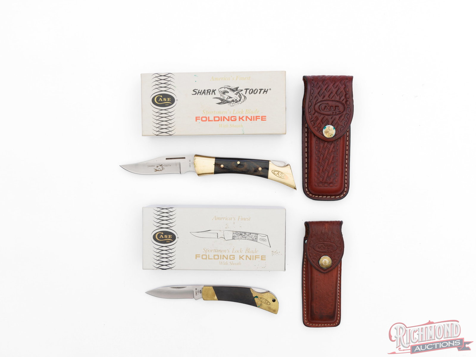 Two Case XX Sportsmen's Lock-Back Folder Knives One "Shark Tooth" With Sheaths: This lot consist of two Case XX Sportsmen's Lock Back folder knives, both with leather sheaths. One model P197-SSP "Shark Tooth" features a 3" stainless clip point blade, brass liner, bolsters and