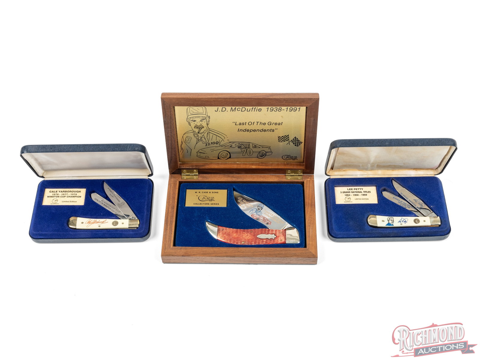 Three Nascar Driver Legends Case and Hen & Rooster Commemorative Folder Knives: One Case large single folder with etched blade commemorating J.D. McDuffie "Last of the Great Independents". Brass liner, nickel bolsters and red jigged bone handle. Comes in a walnut display case. On