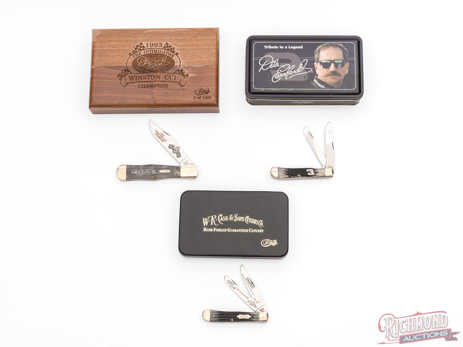 Three Case XX Dale Earnhardt Commemorative Folder Knives in Original Cases: This lot includes three different Case XX Dale Earnhardt commemorative folder knives. One model 6254 SS with two blades and gray-black jigged bone handle with a silver inlaid "3". Comes in the origina
